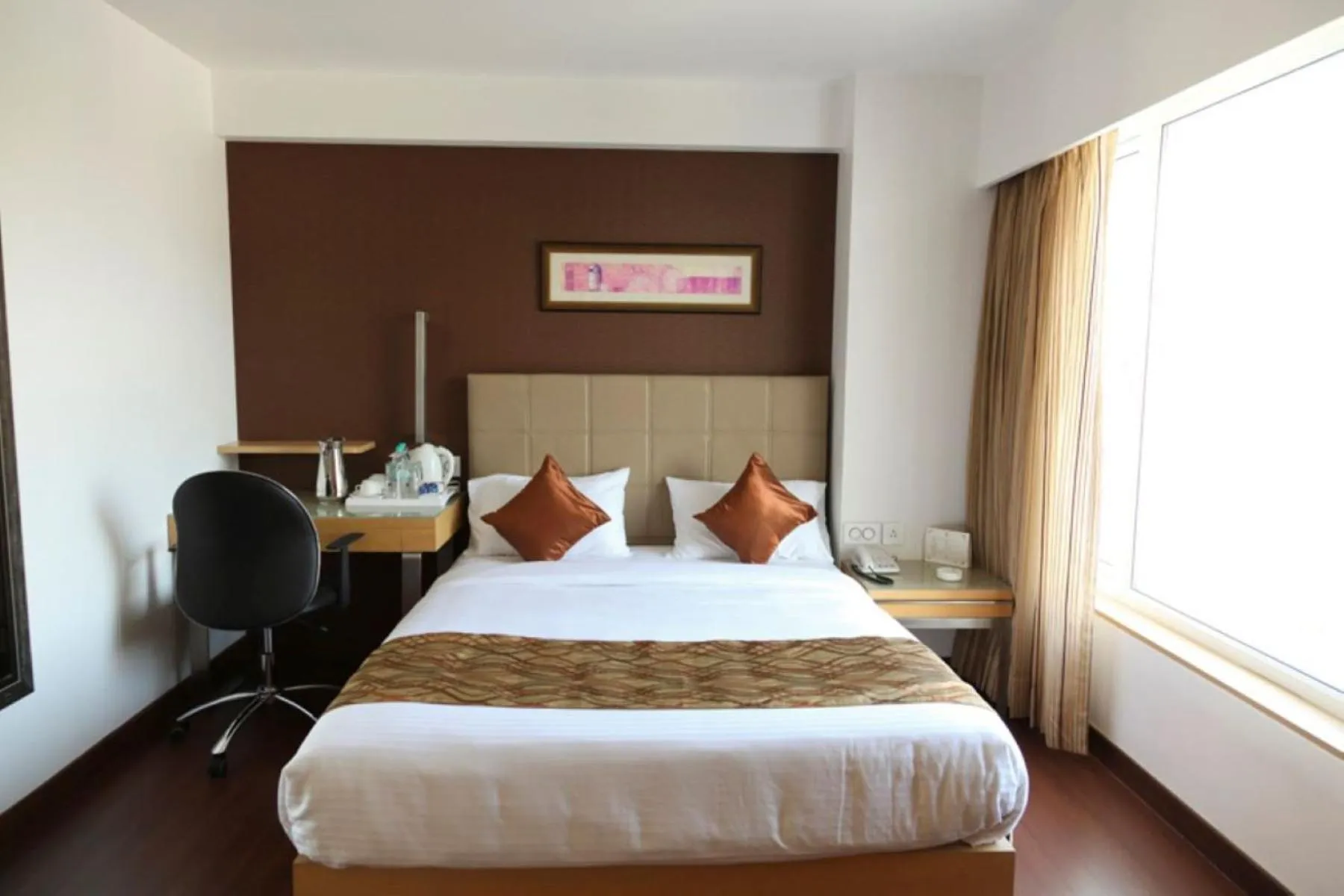 Bed in Hotel Suba Star Ahmedabad