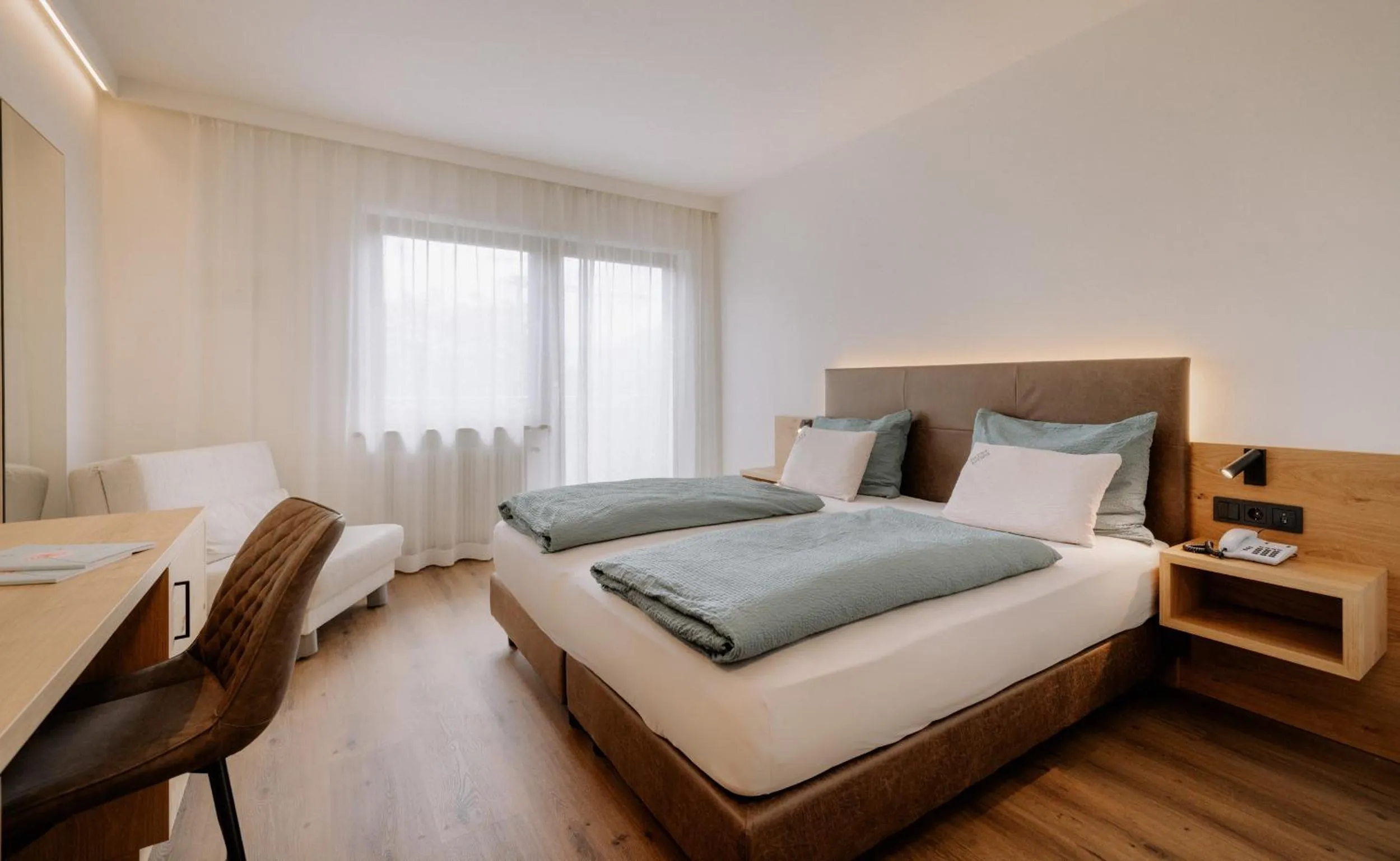 Bed in Garni-Hotel Farmerhof