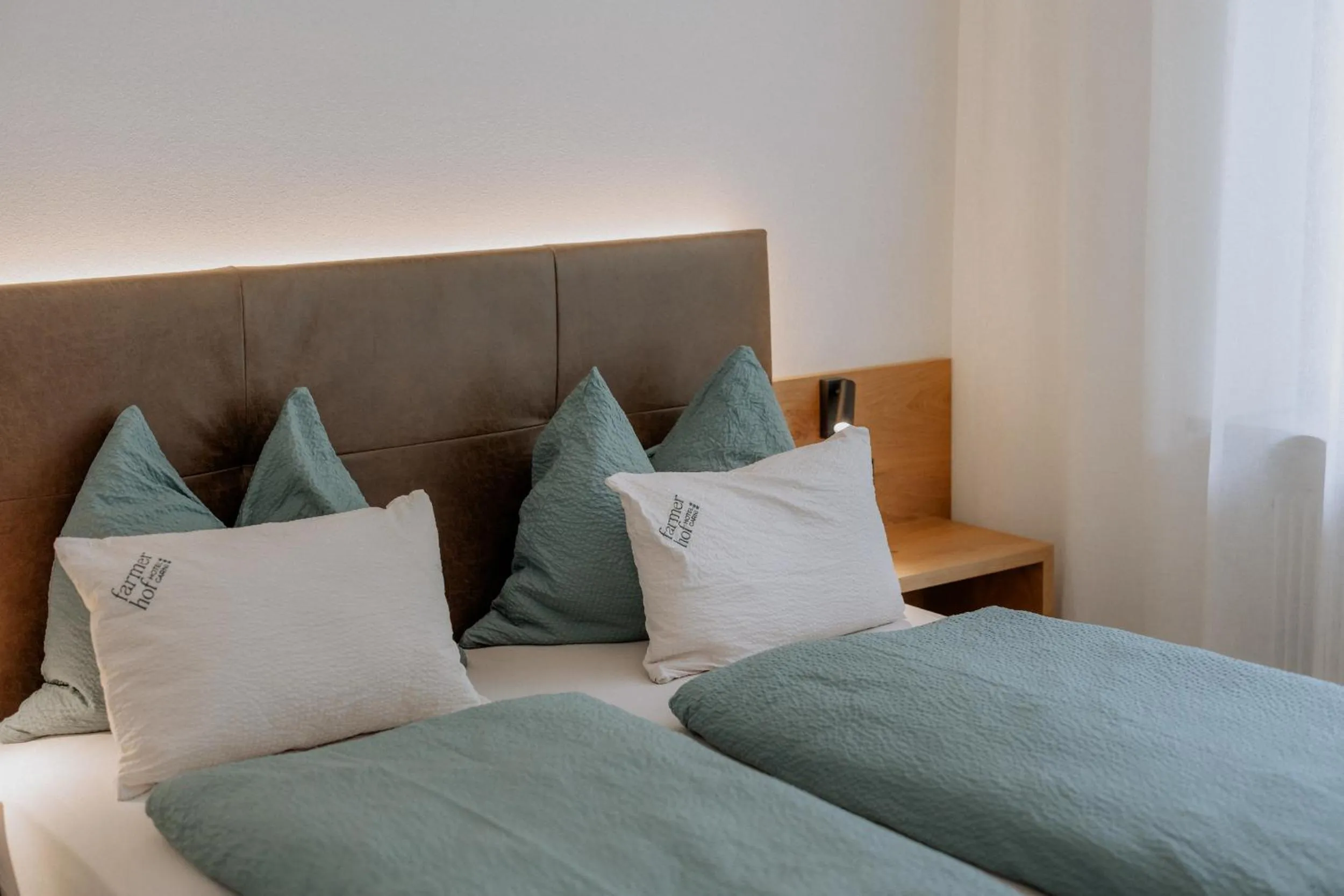 Bed in Garni-Hotel Farmerhof