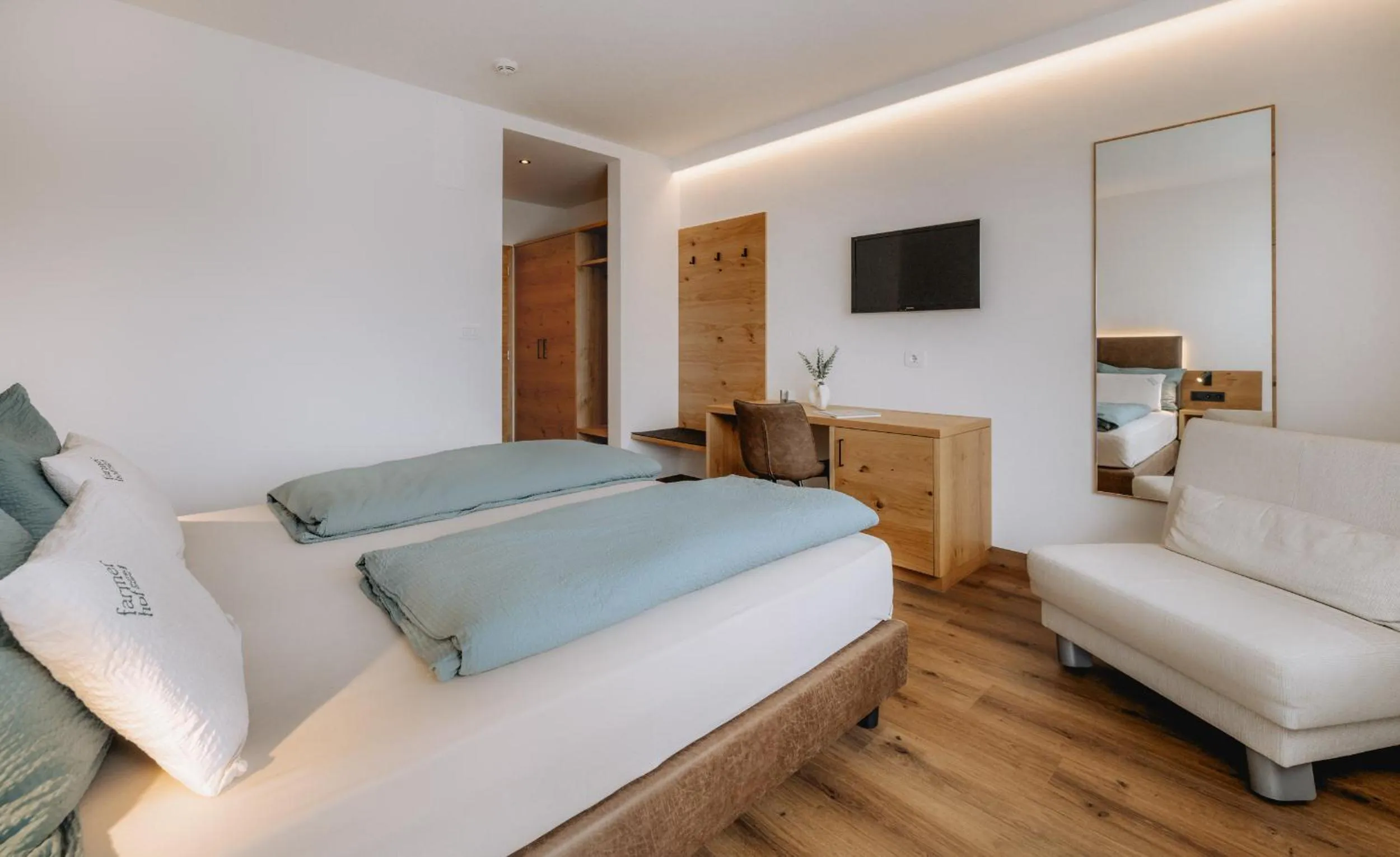 Bed in Garni-Hotel Farmerhof