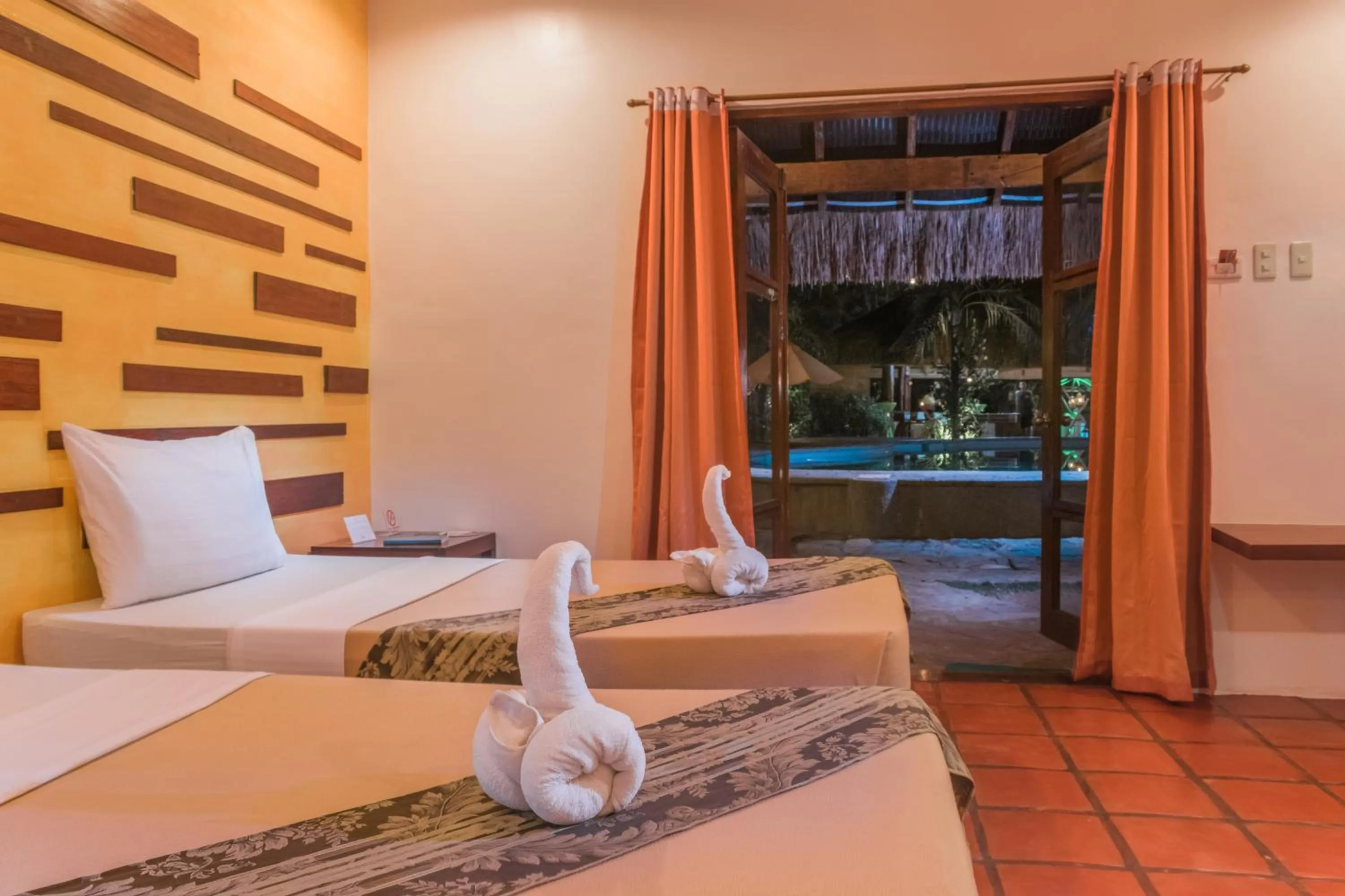 Bed in Acacia Tree Garden Hotel