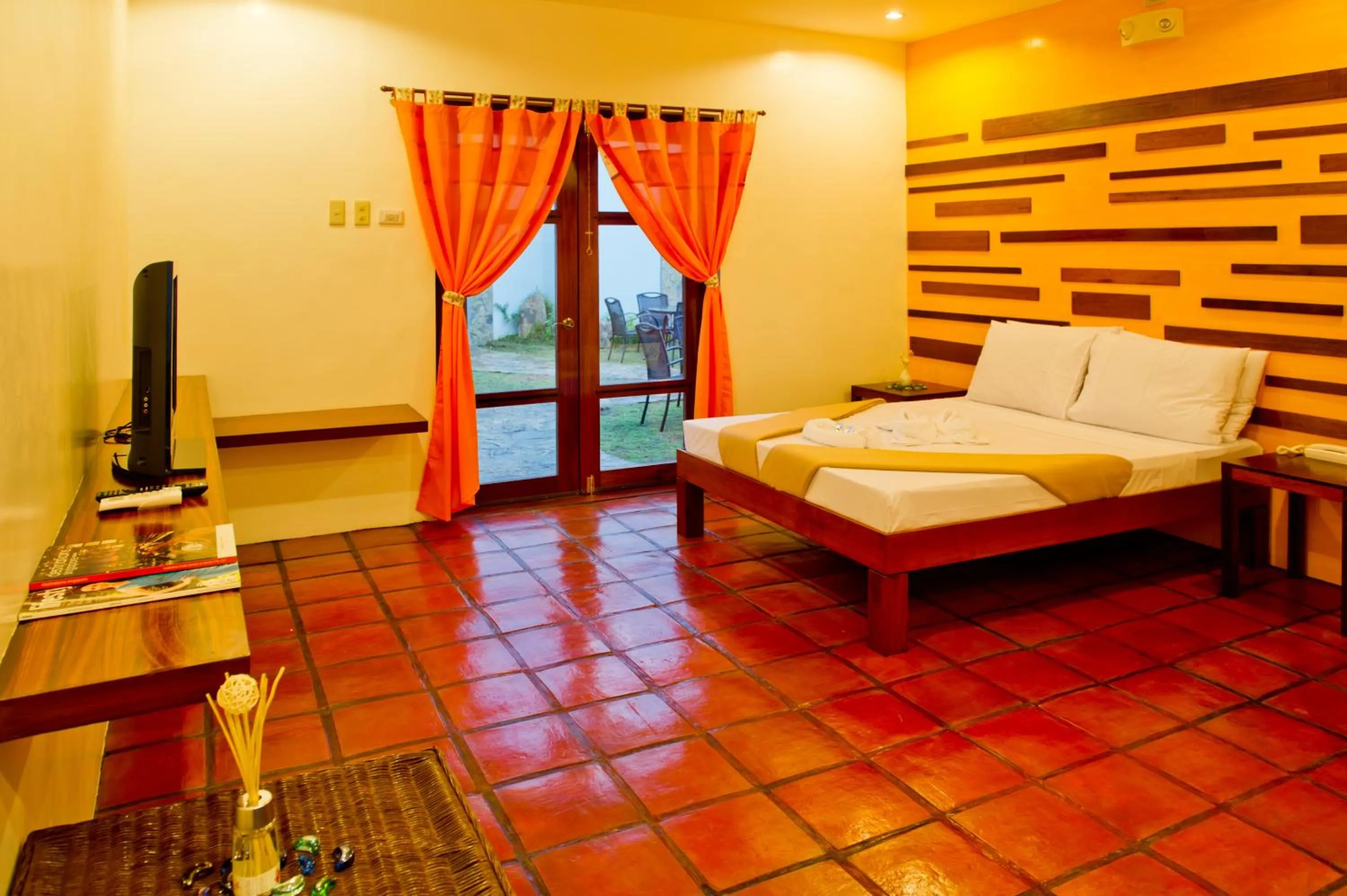 Bed in Acacia Tree Garden Hotel