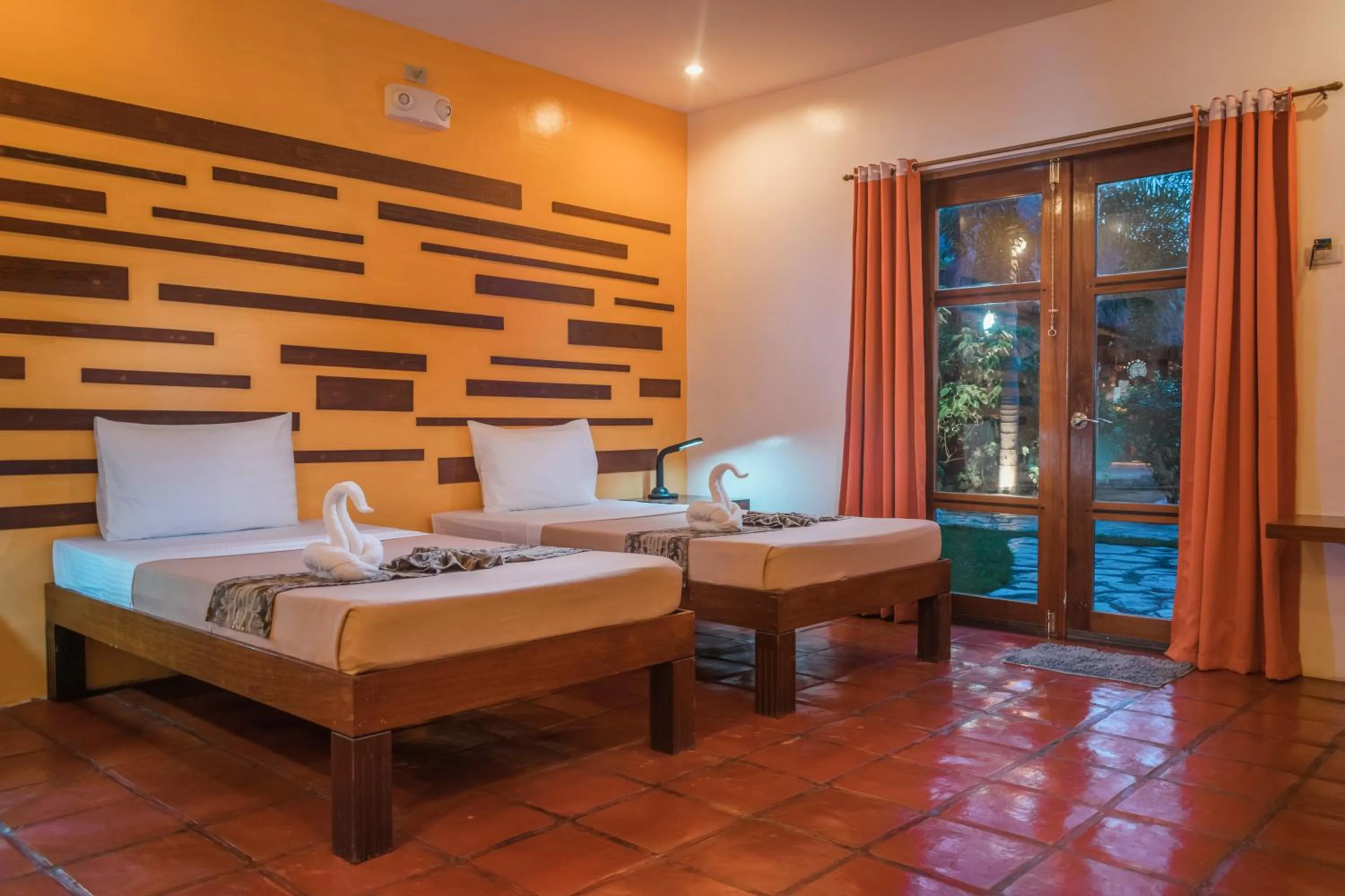 Bed in Acacia Tree Garden Hotel