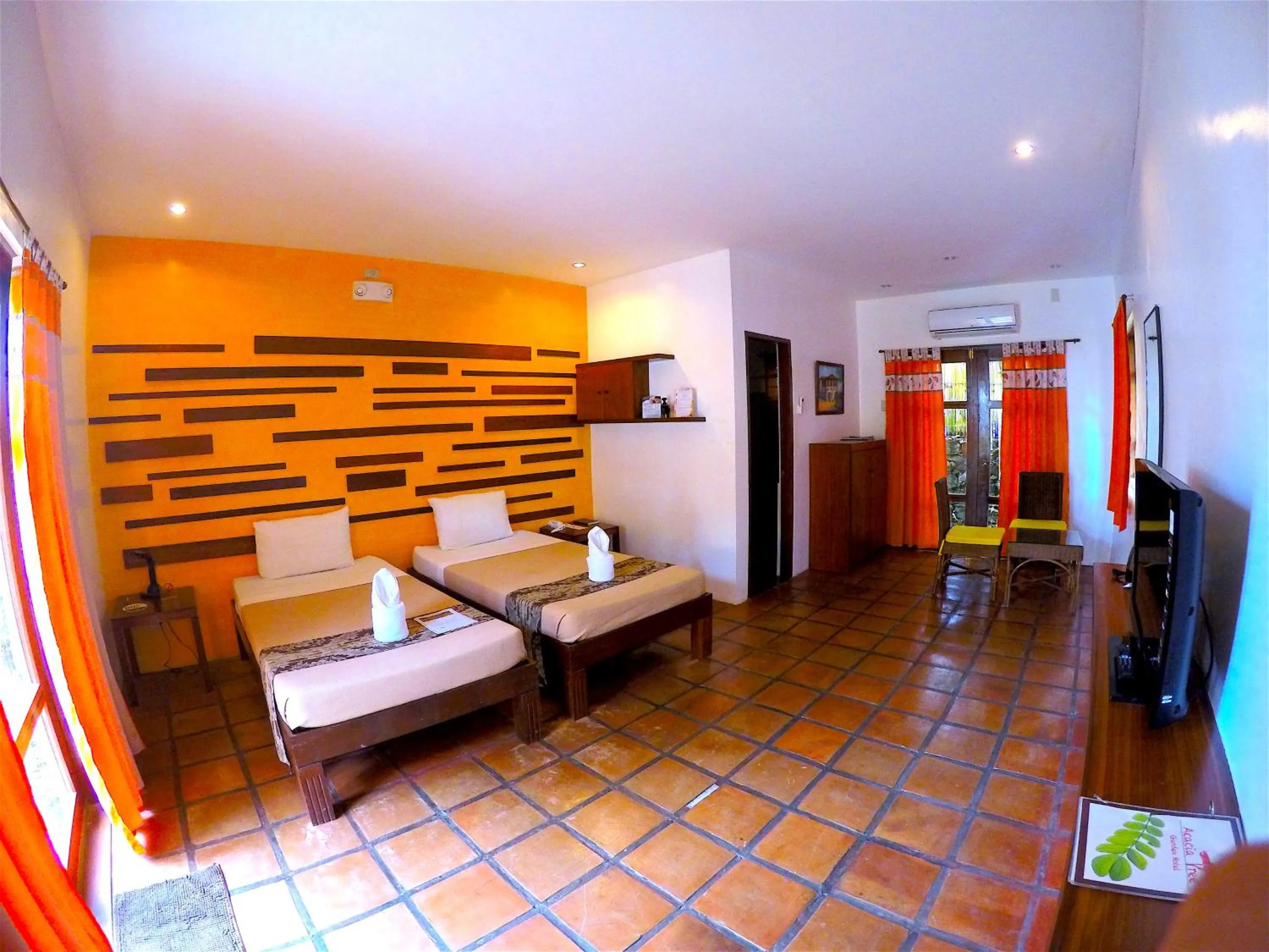 Bed in Acacia Tree Garden Hotel