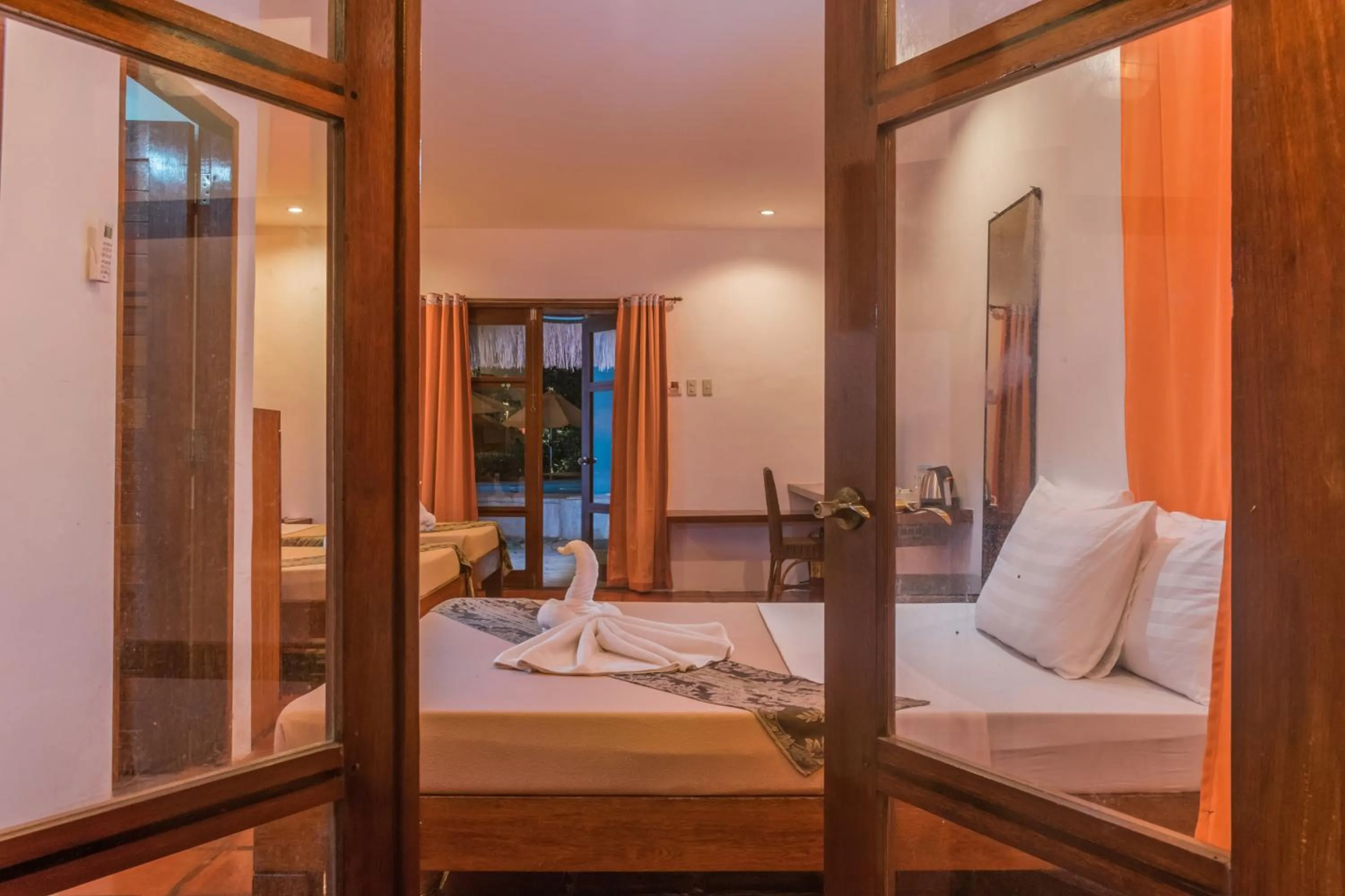 Bed in Acacia Tree Garden Hotel