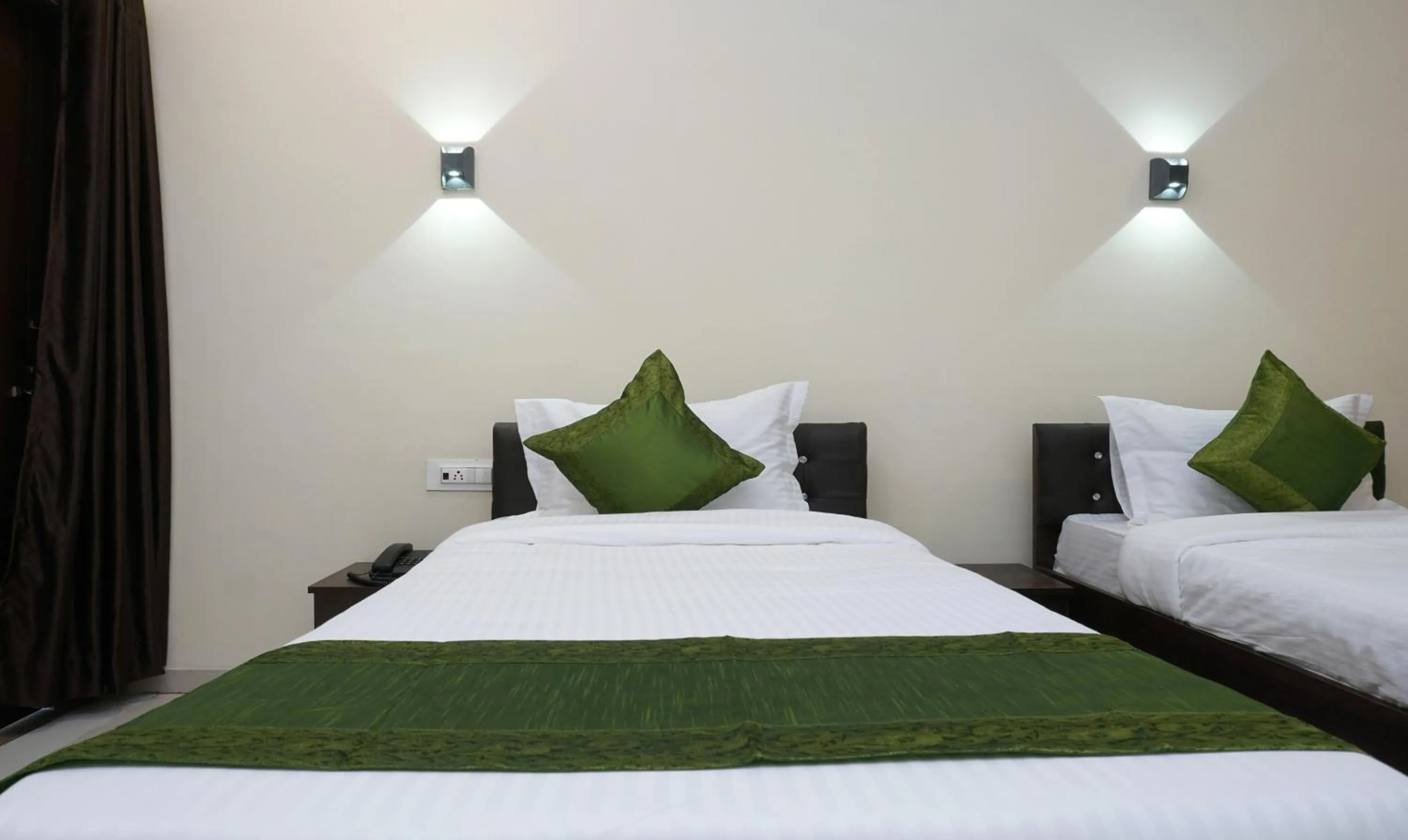 Bedroom, Bed in Treebo Lotus Baner