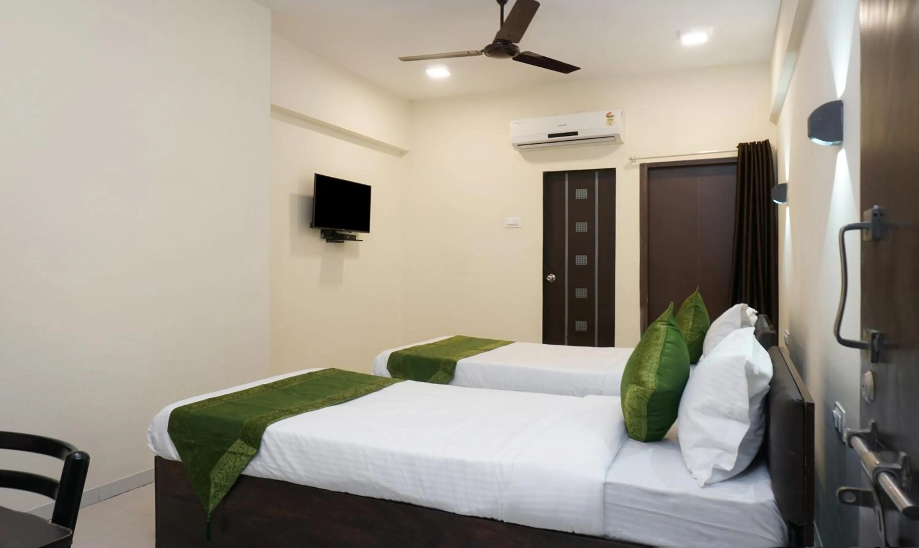 Bedroom, Bed in Treebo Lotus Baner