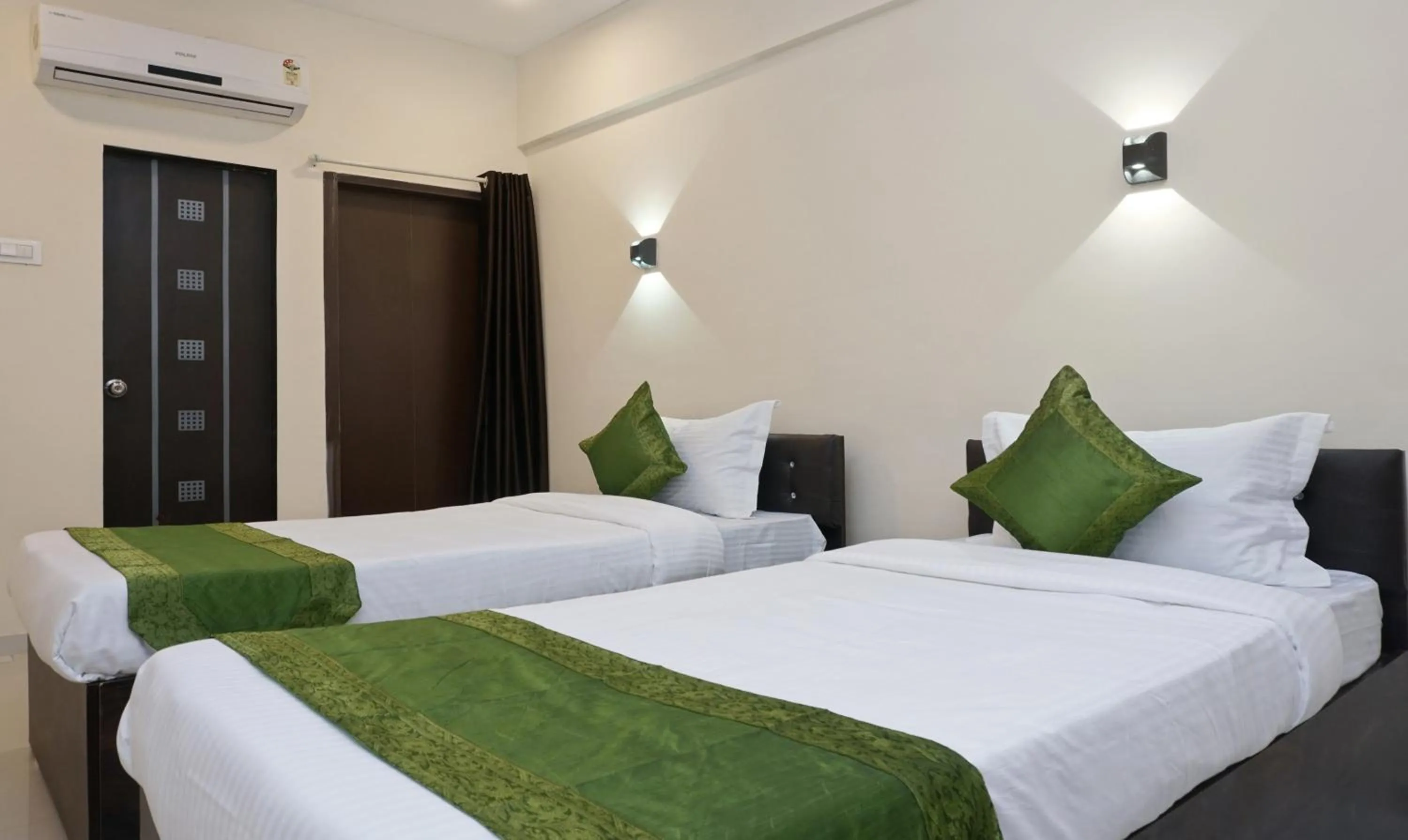 Bedroom, Bed in Treebo Lotus Baner