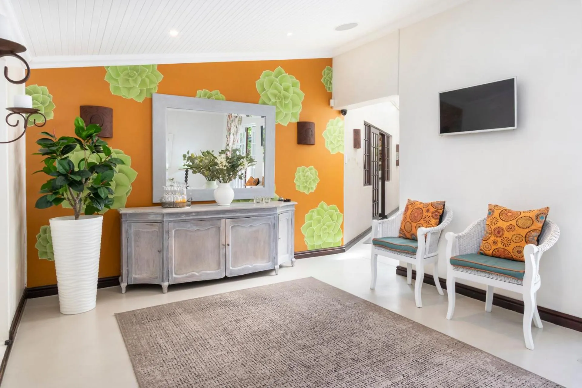 Communal lounge/ TV room in The Potting Shed Guest House