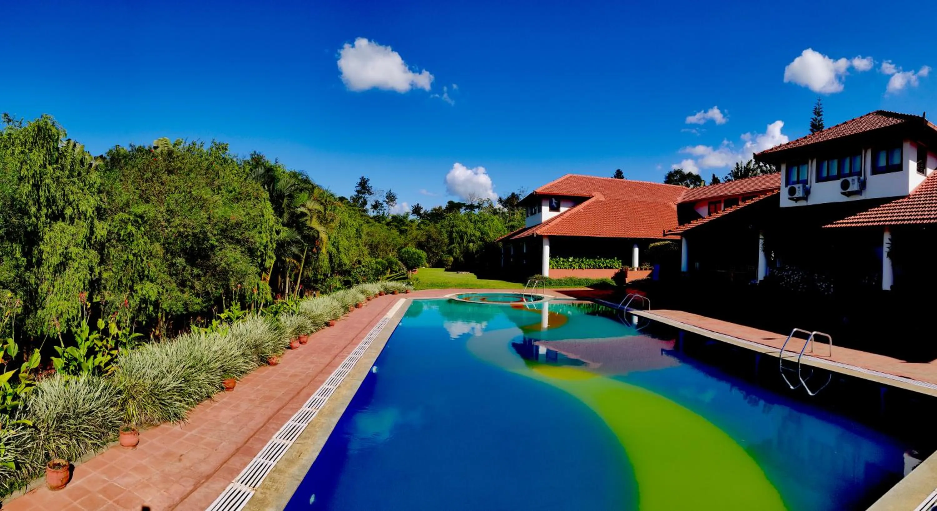Swimming pool in Kadkani River Resort Coorg