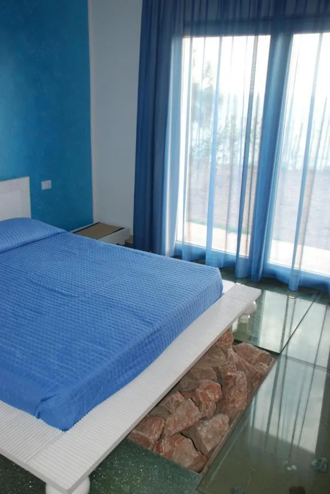 Day, Bed in La Rosa dei Venti Resort