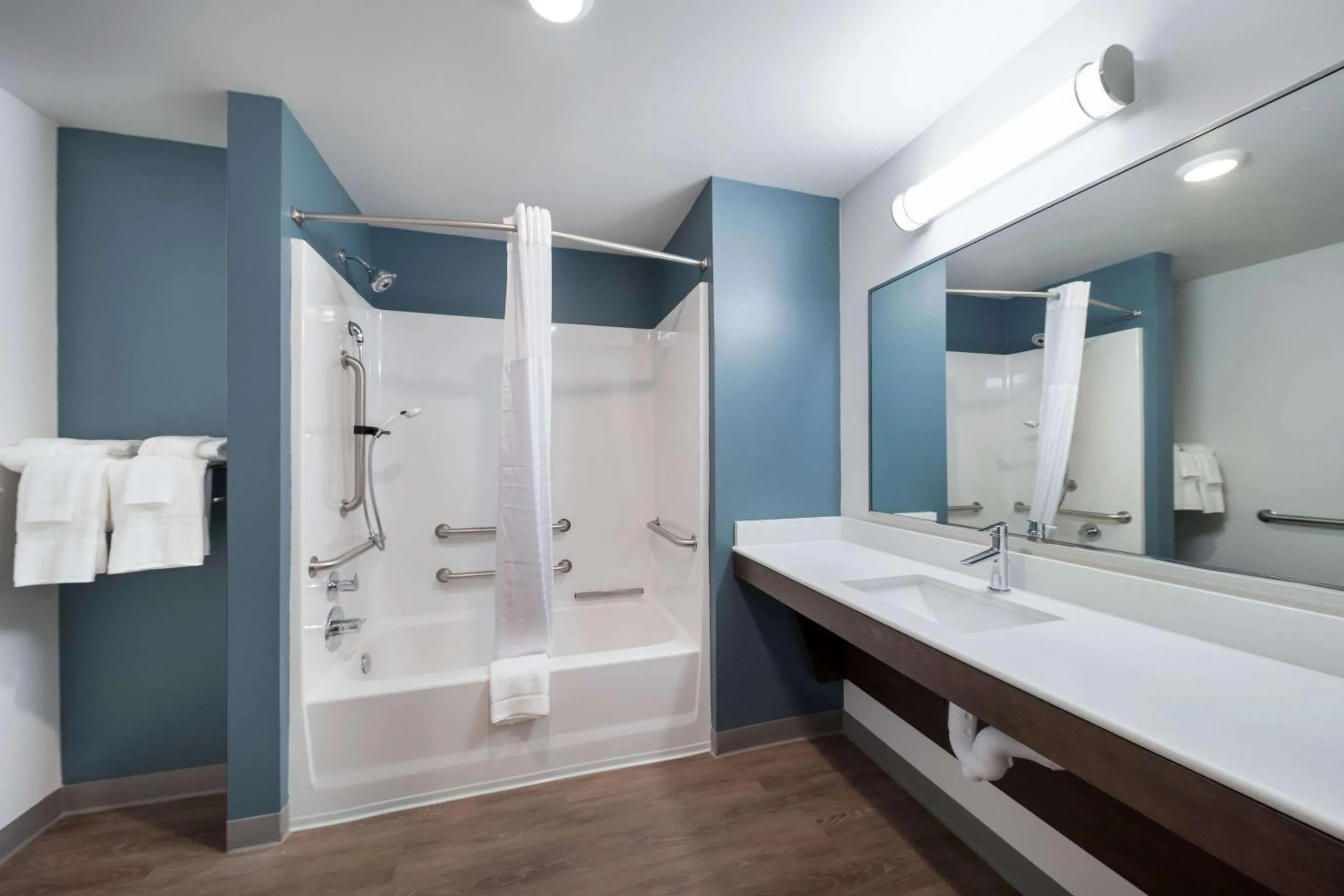 Bathroom in WoodSpring Suites Dallas Plano Central Legacy Drive