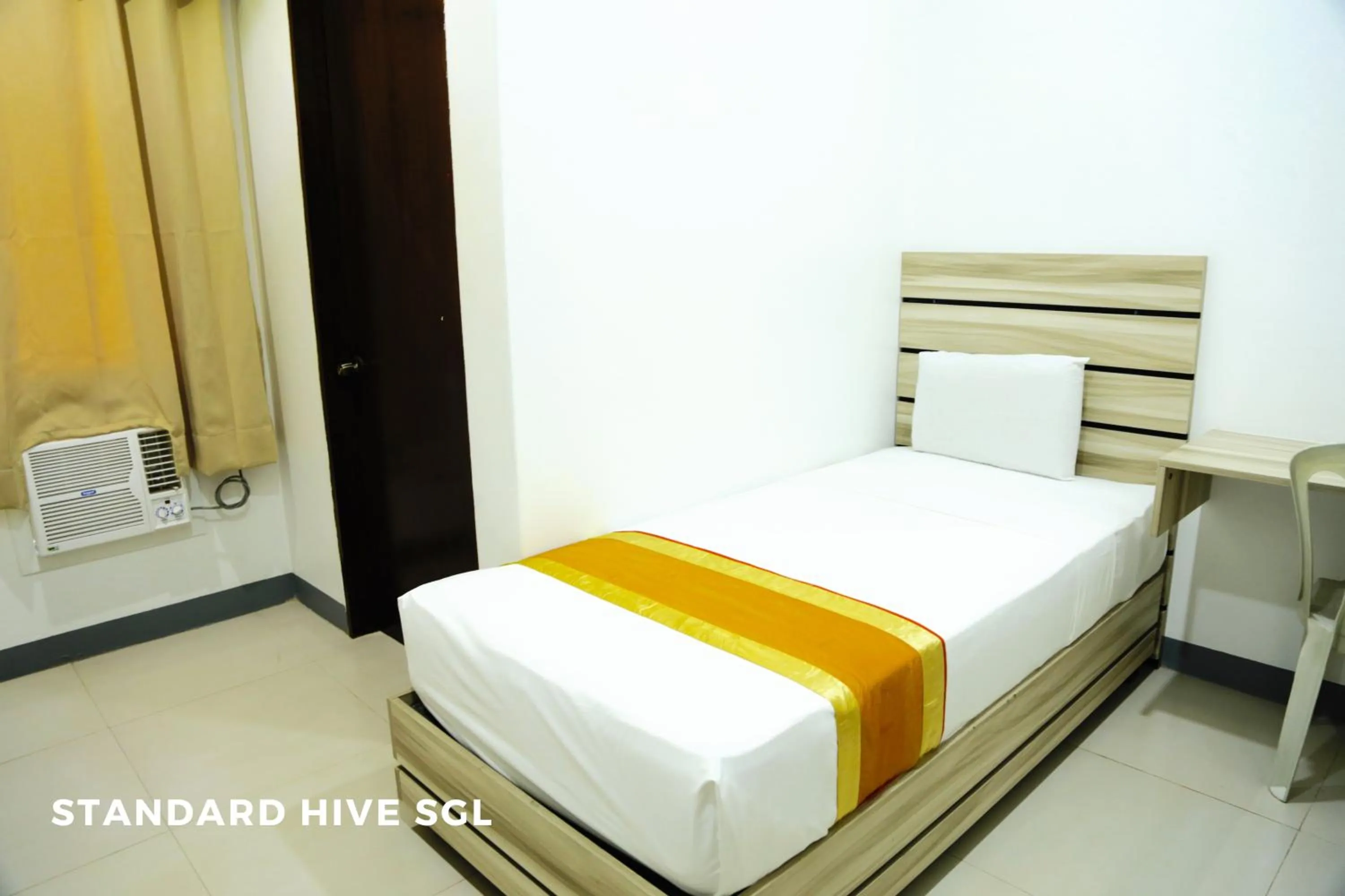 Bed in Travelbee Fuente Inn