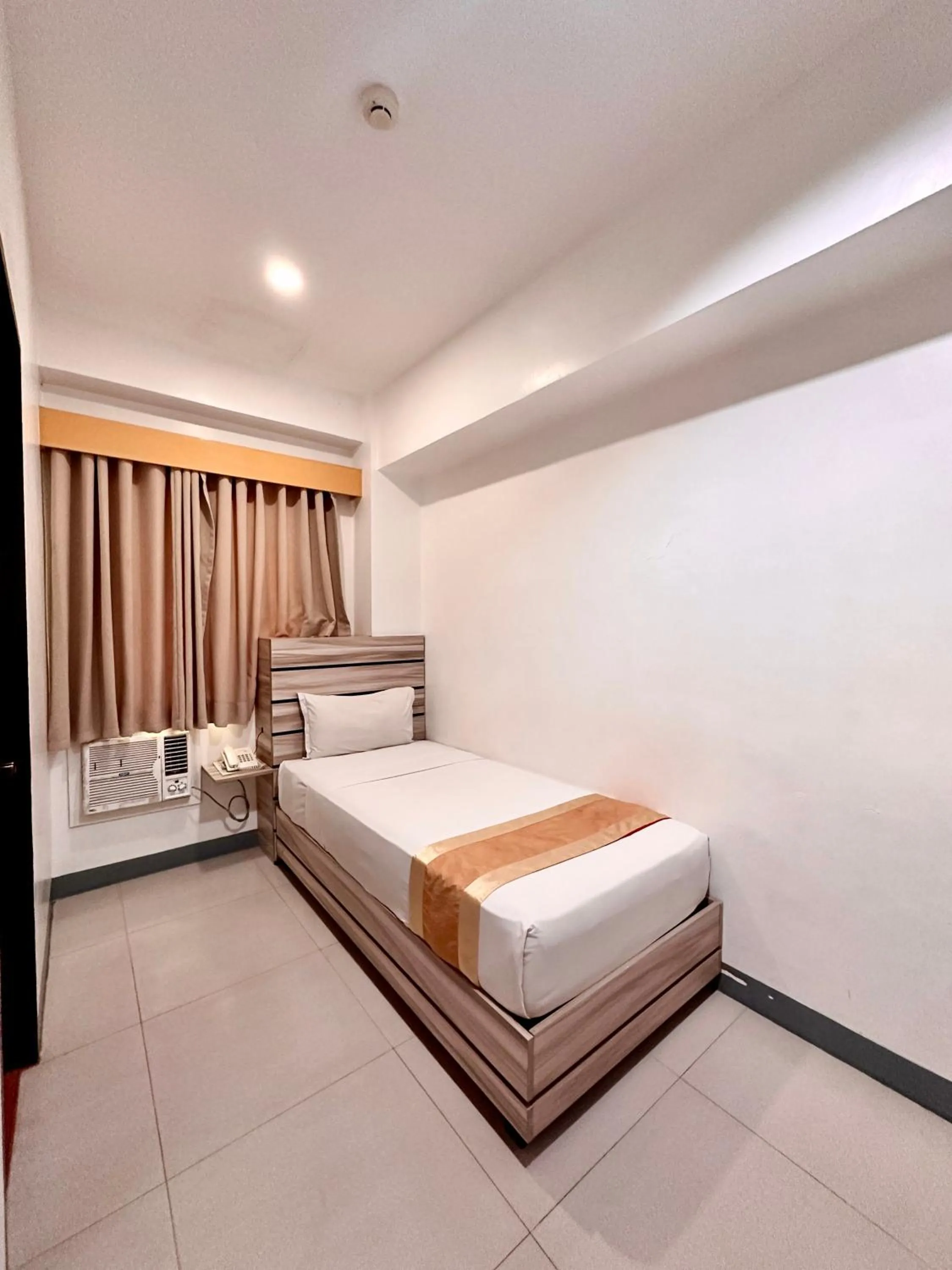 Bed in Travelbee Fuente Inn