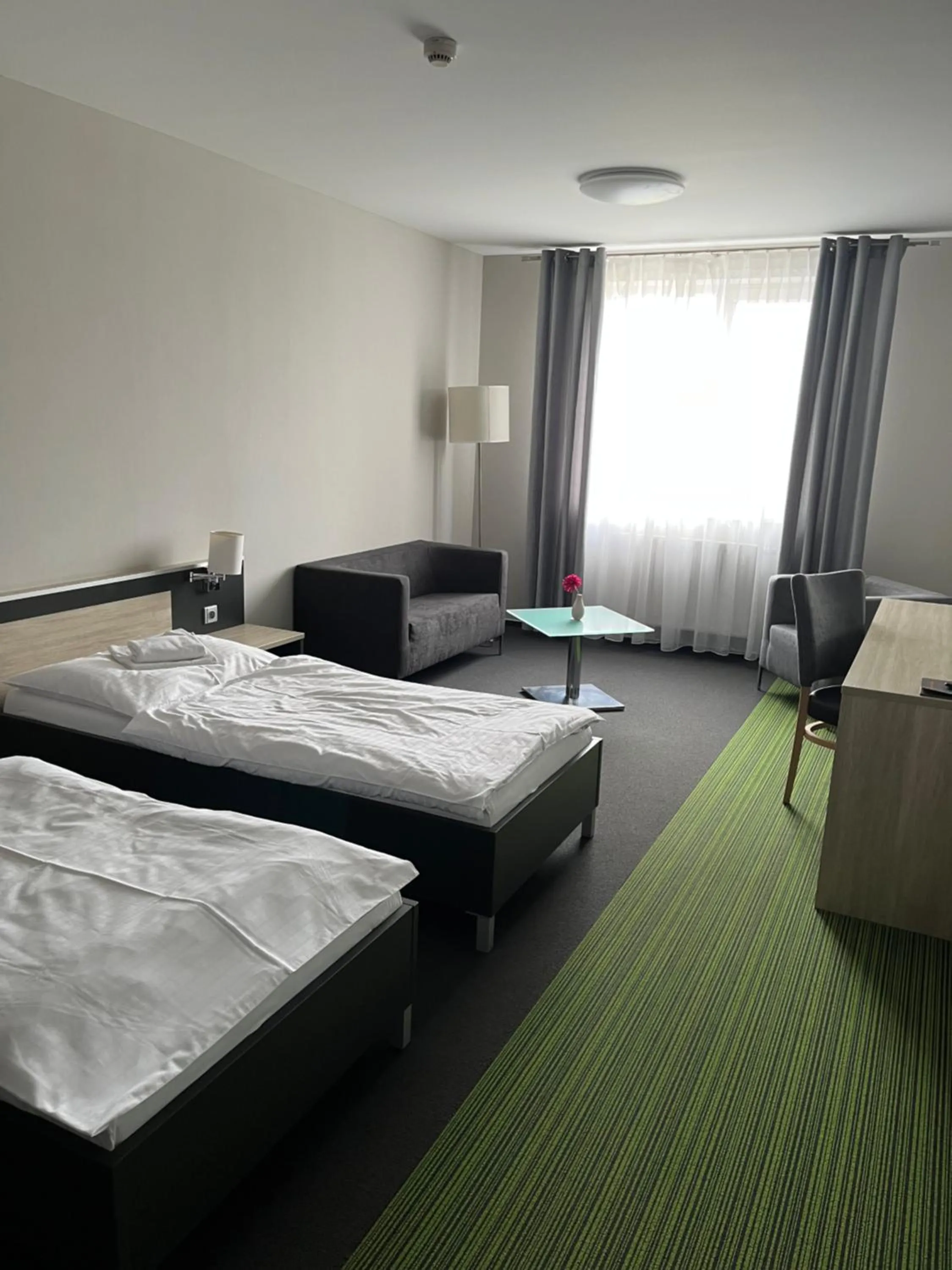 Photo of the whole room, Bed in Buly Aréna
