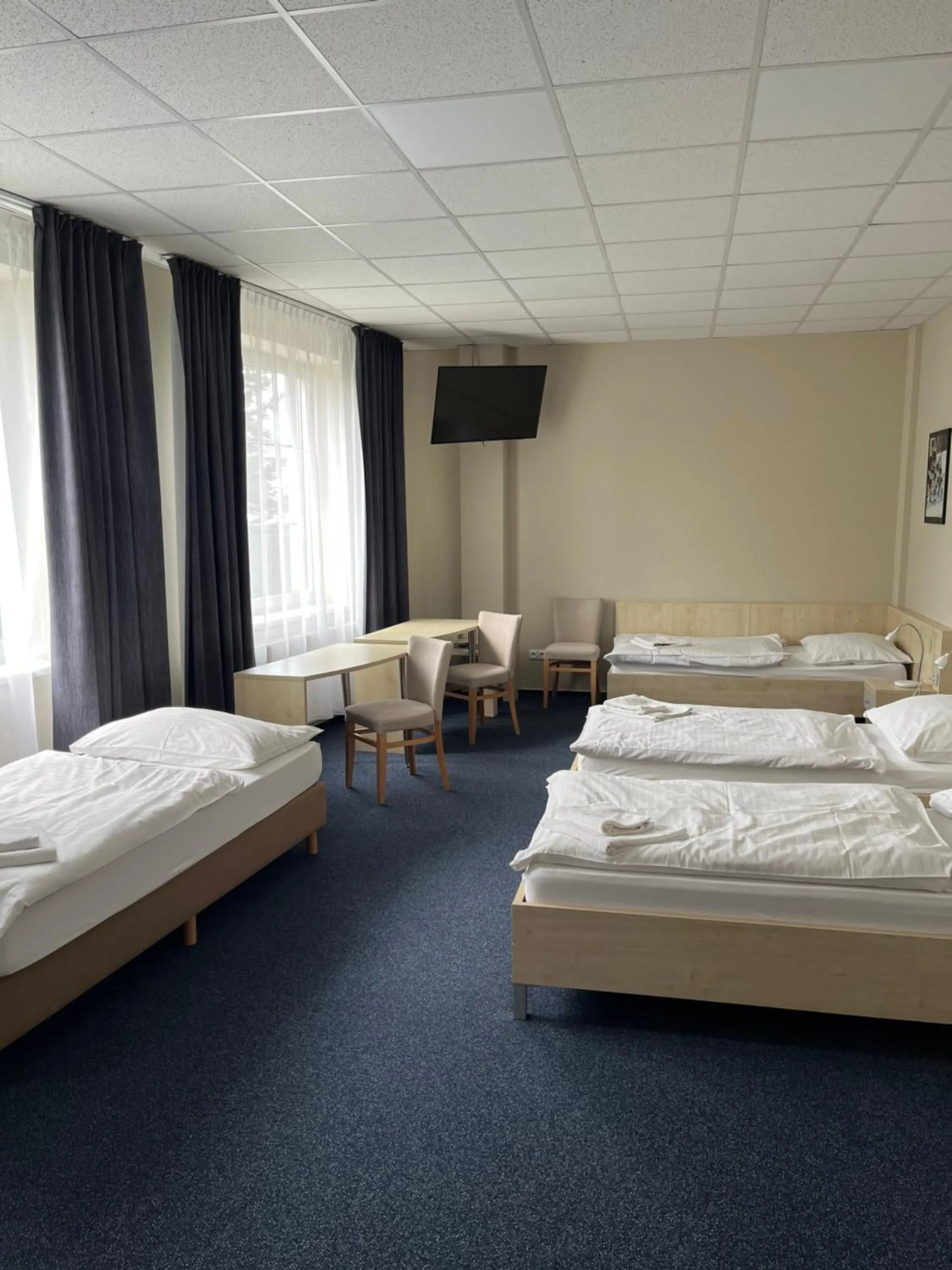 Photo of the whole room, Bed in Buly Aréna