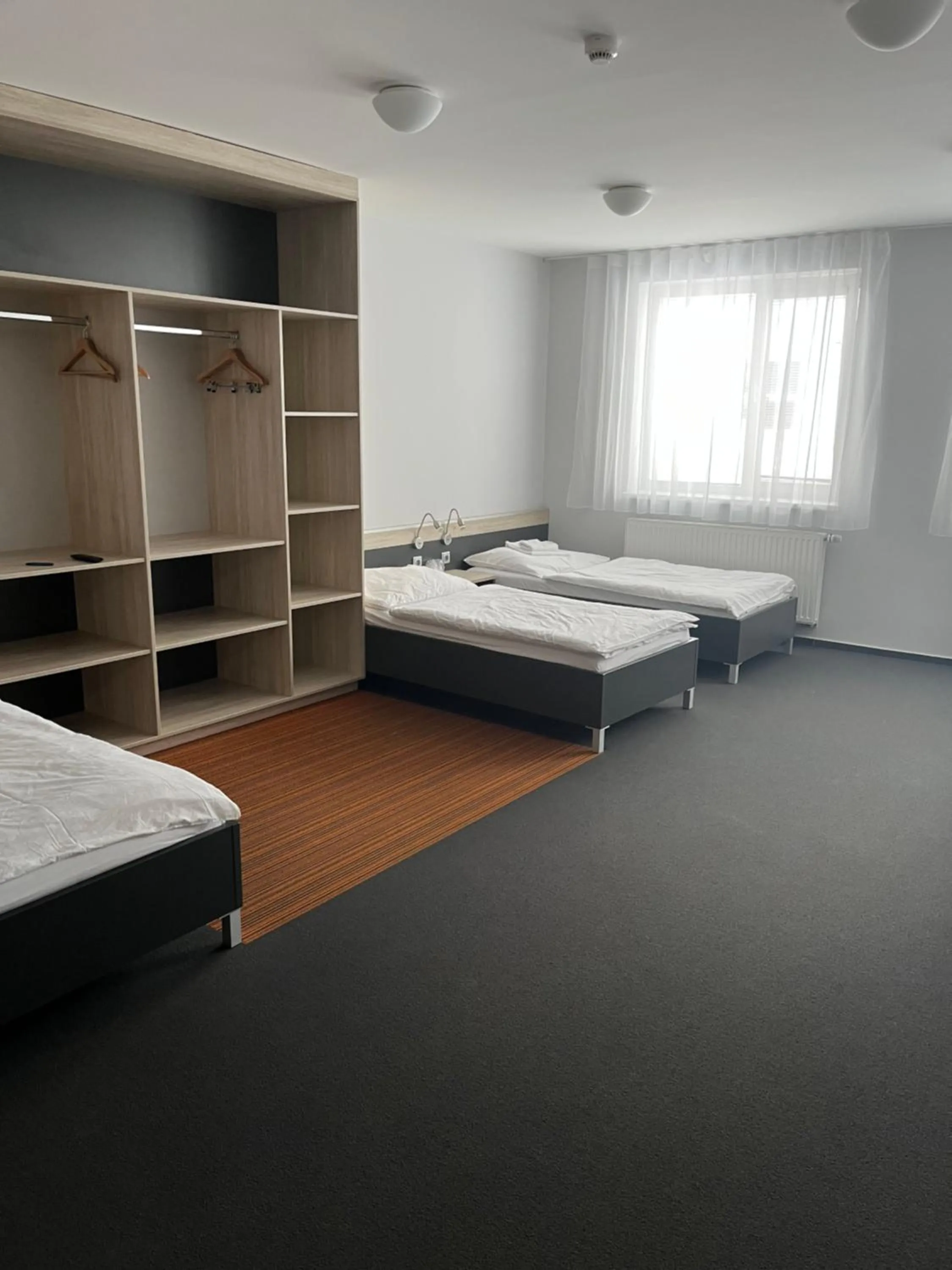 Photo of the whole room, Bed in Buly Aréna
