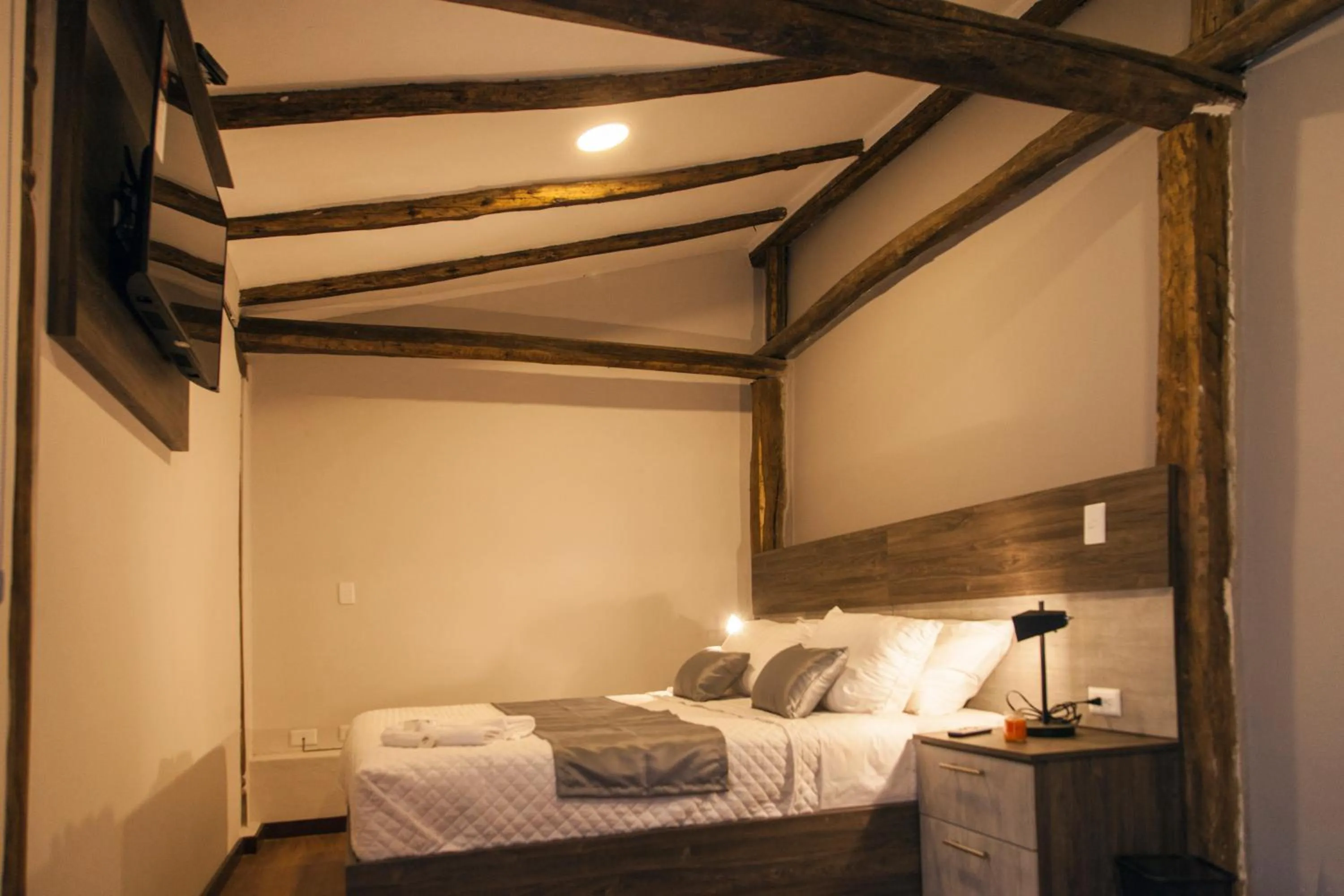 Bed in Hotel Raymipampa