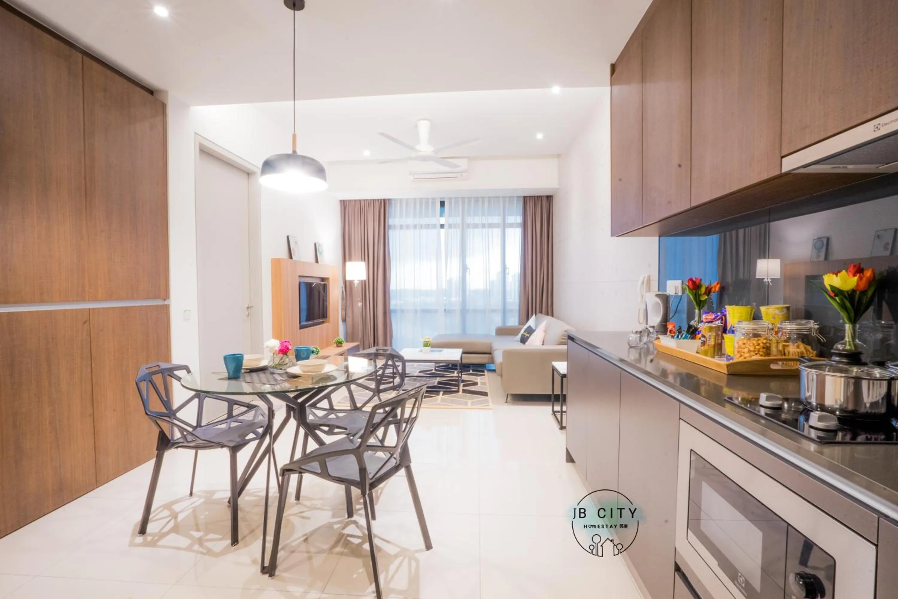 Kitchen or kitchenette in Grand Medini Suites by RR JBcity