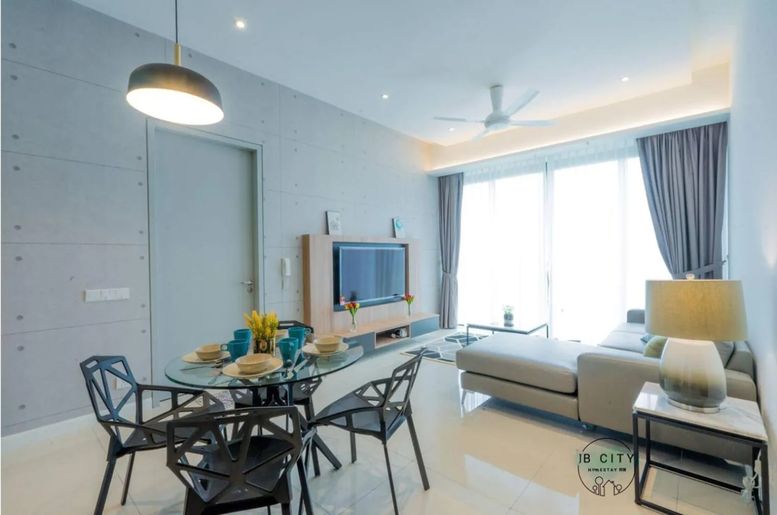 Living room in Grand Medini Suites by RR JBcity