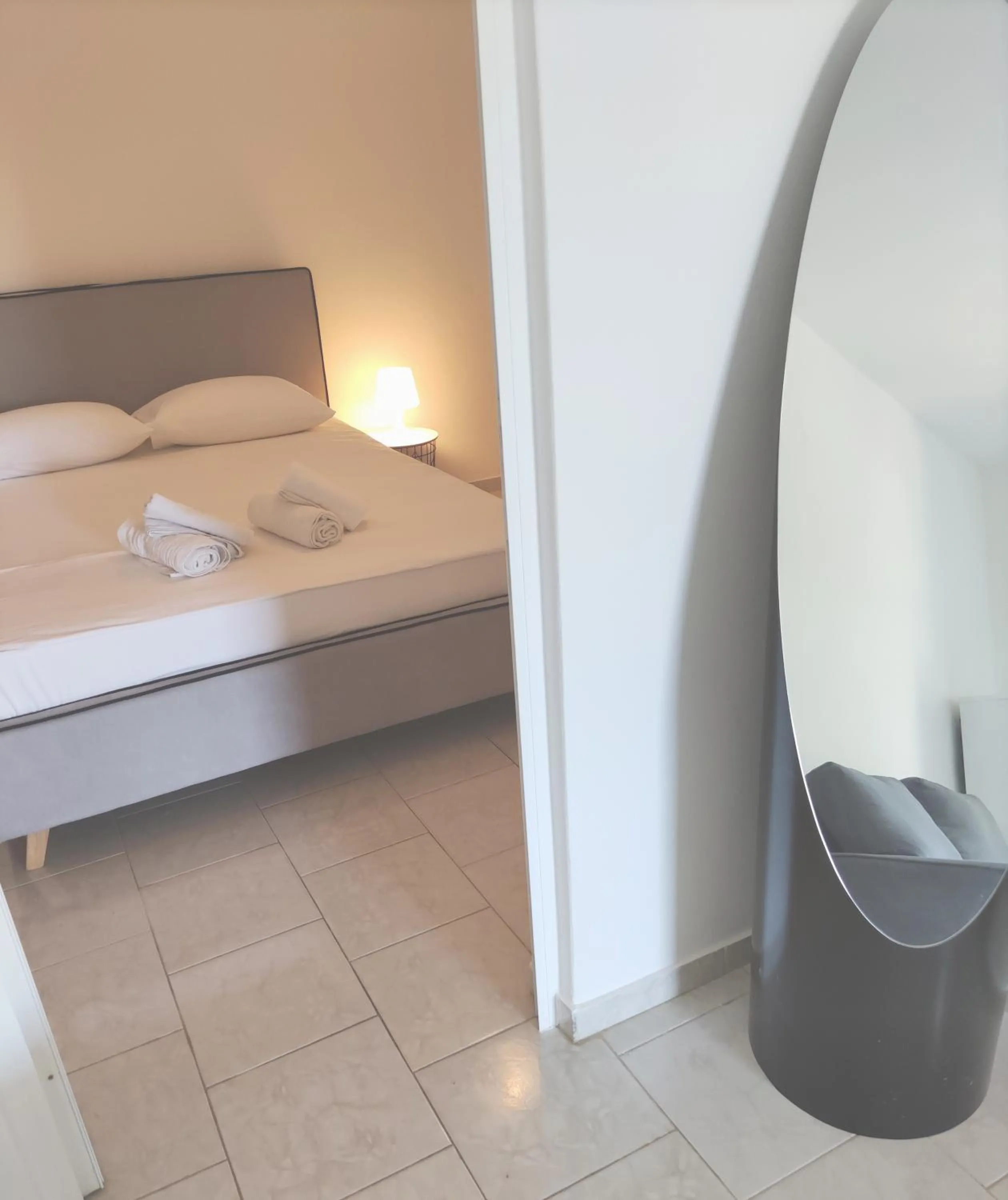 Bed in Galini Rooms & Apartments