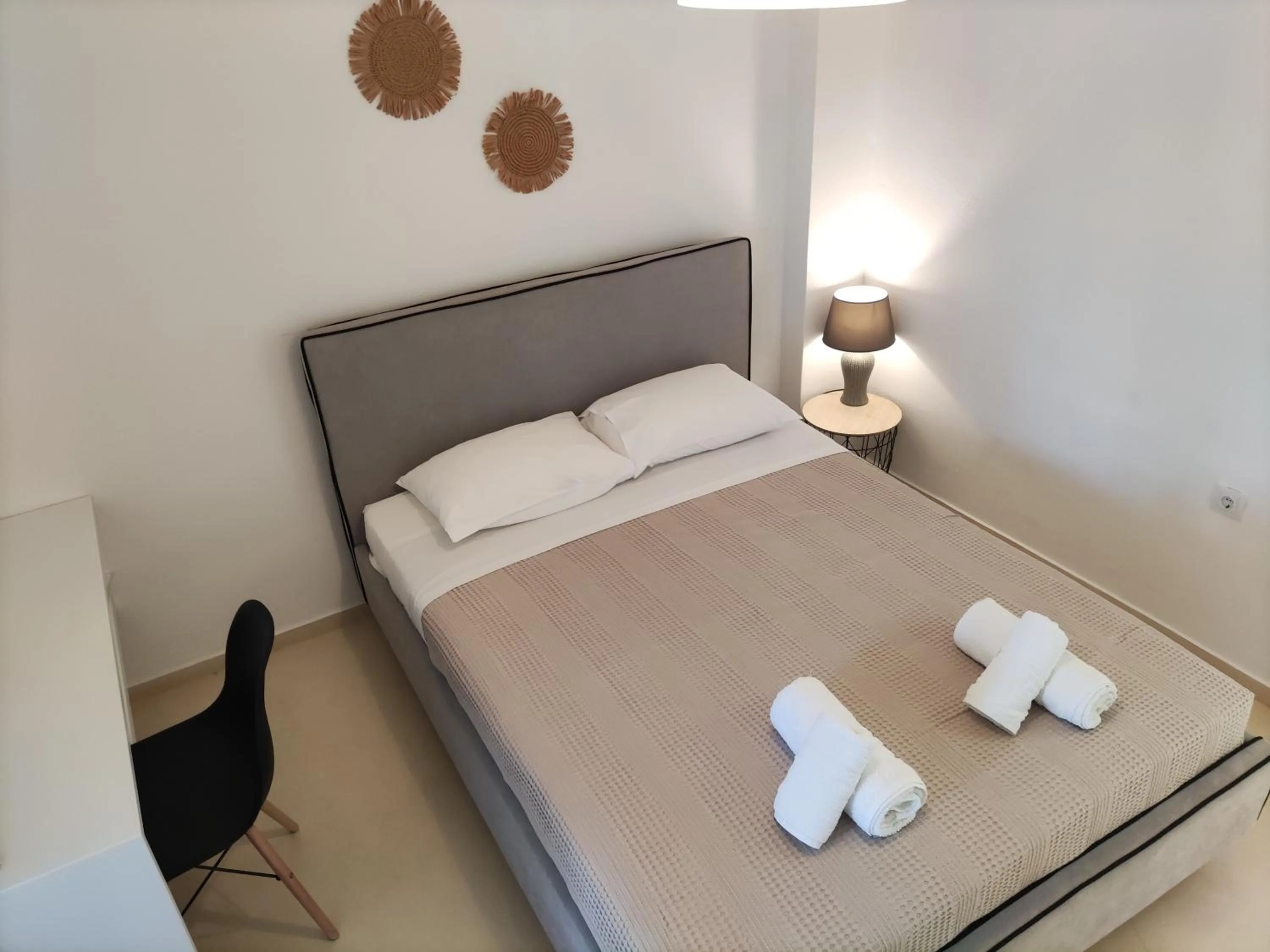 Bed in Galini Rooms & Apartments