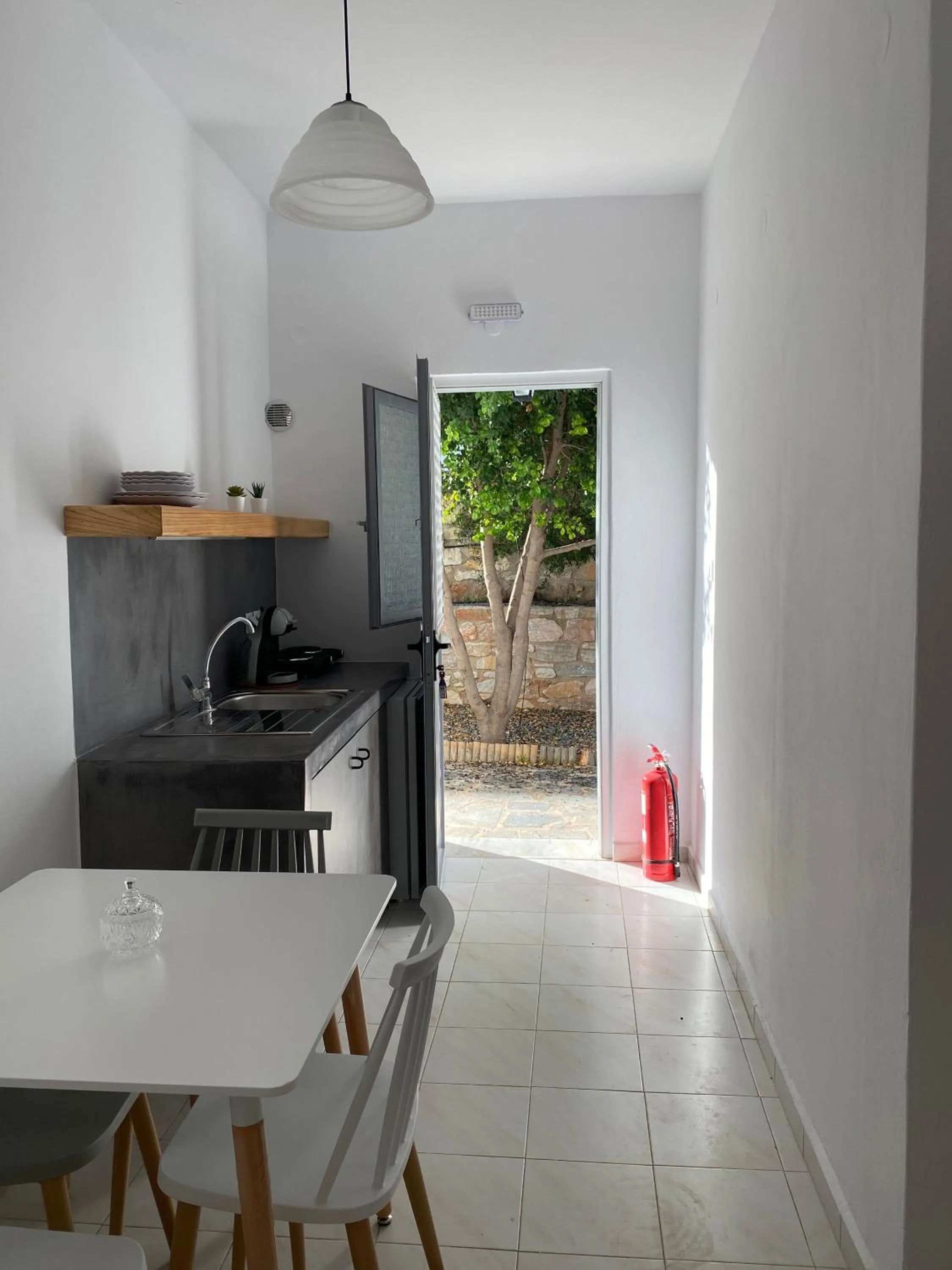 Kitchen or kitchenette in Galini Rooms & Apartments