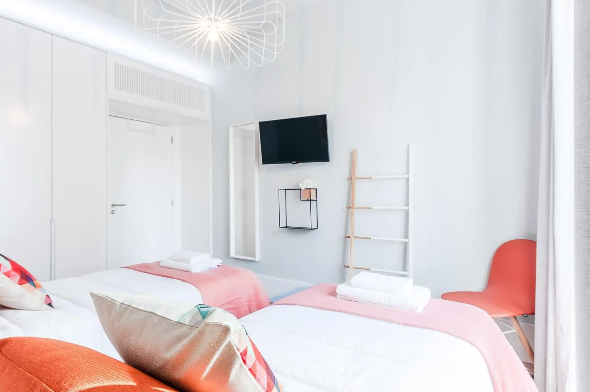 Bed in NLC Rooms & Suites