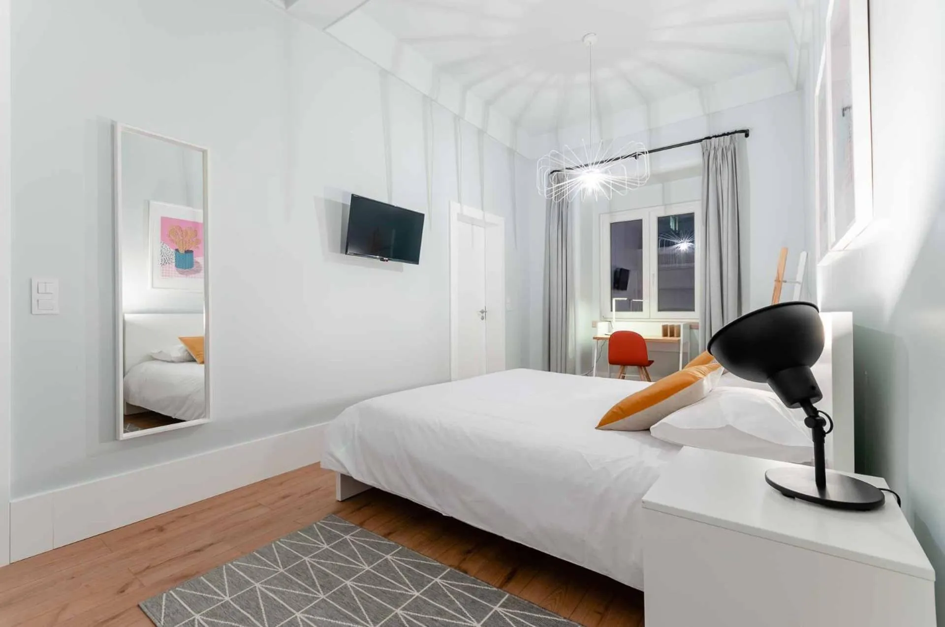 Bed in NLC Rooms & Suites