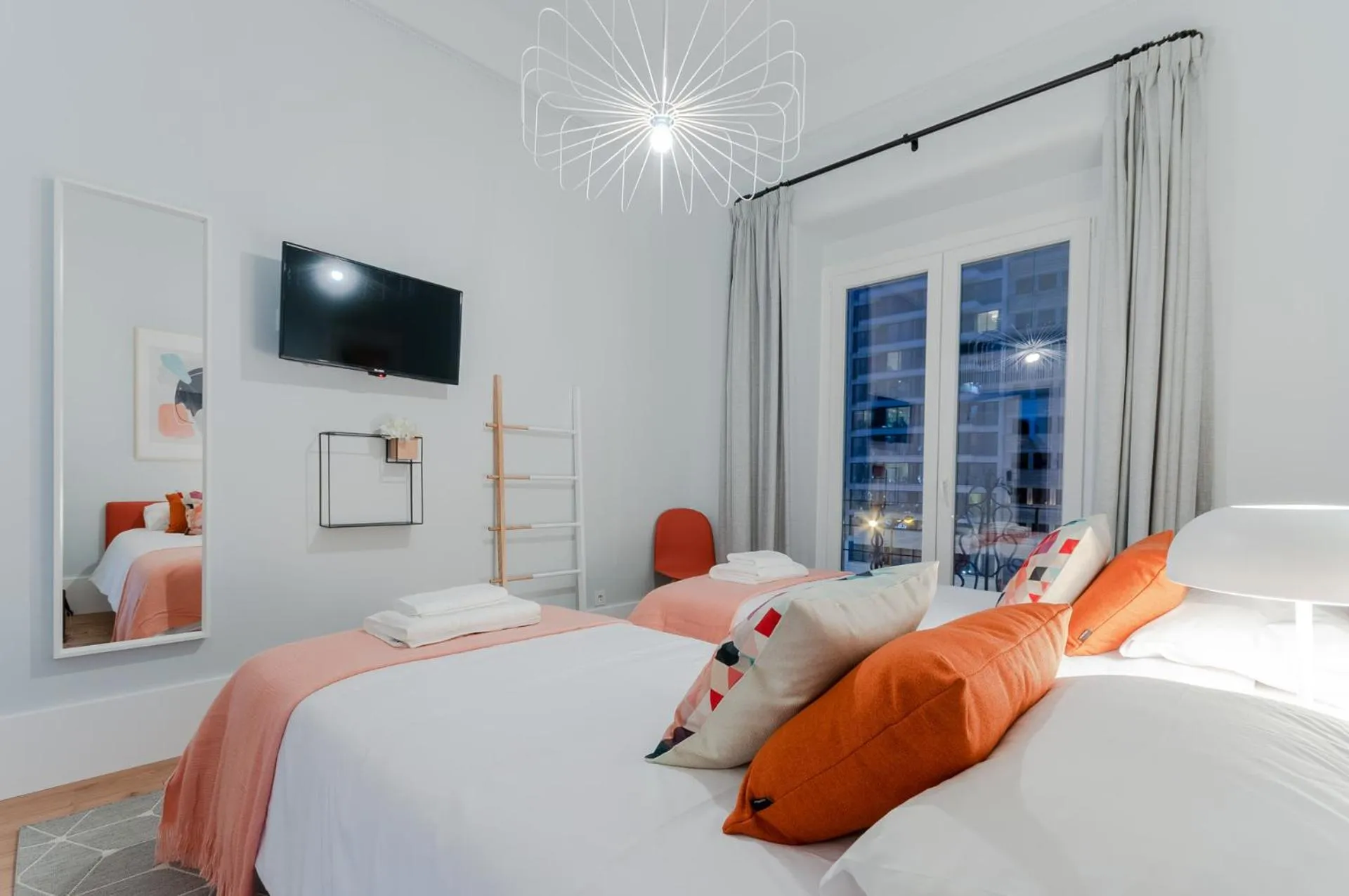 Bed in NLC Rooms & Suites