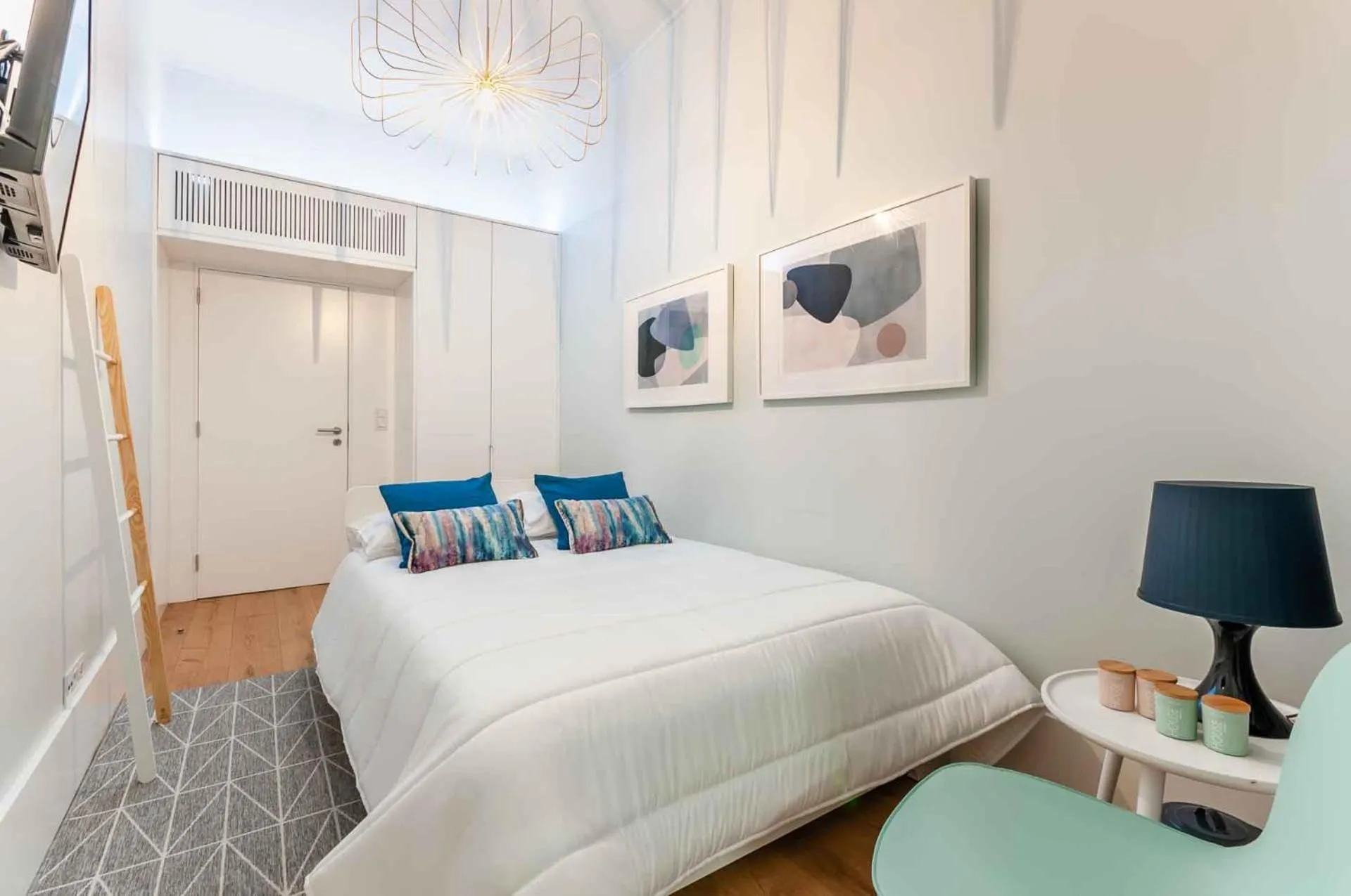 Bed in NLC Rooms & Suites