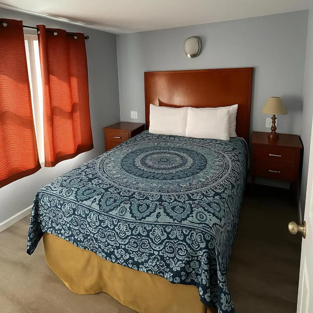 Bed in Atlantic Breeze Motel & Apartments