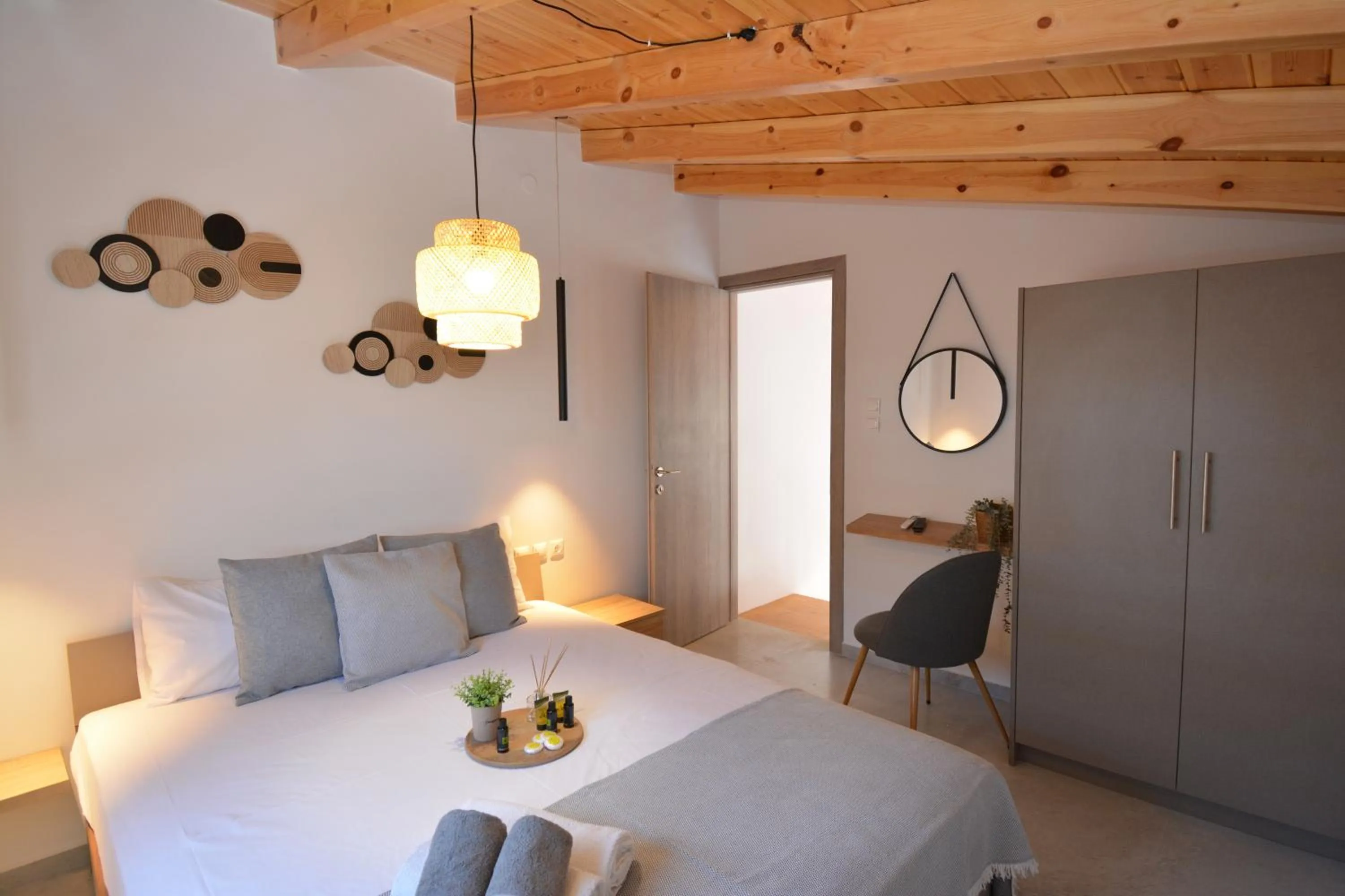 Bed in Michalianna Suites "by Checkin"