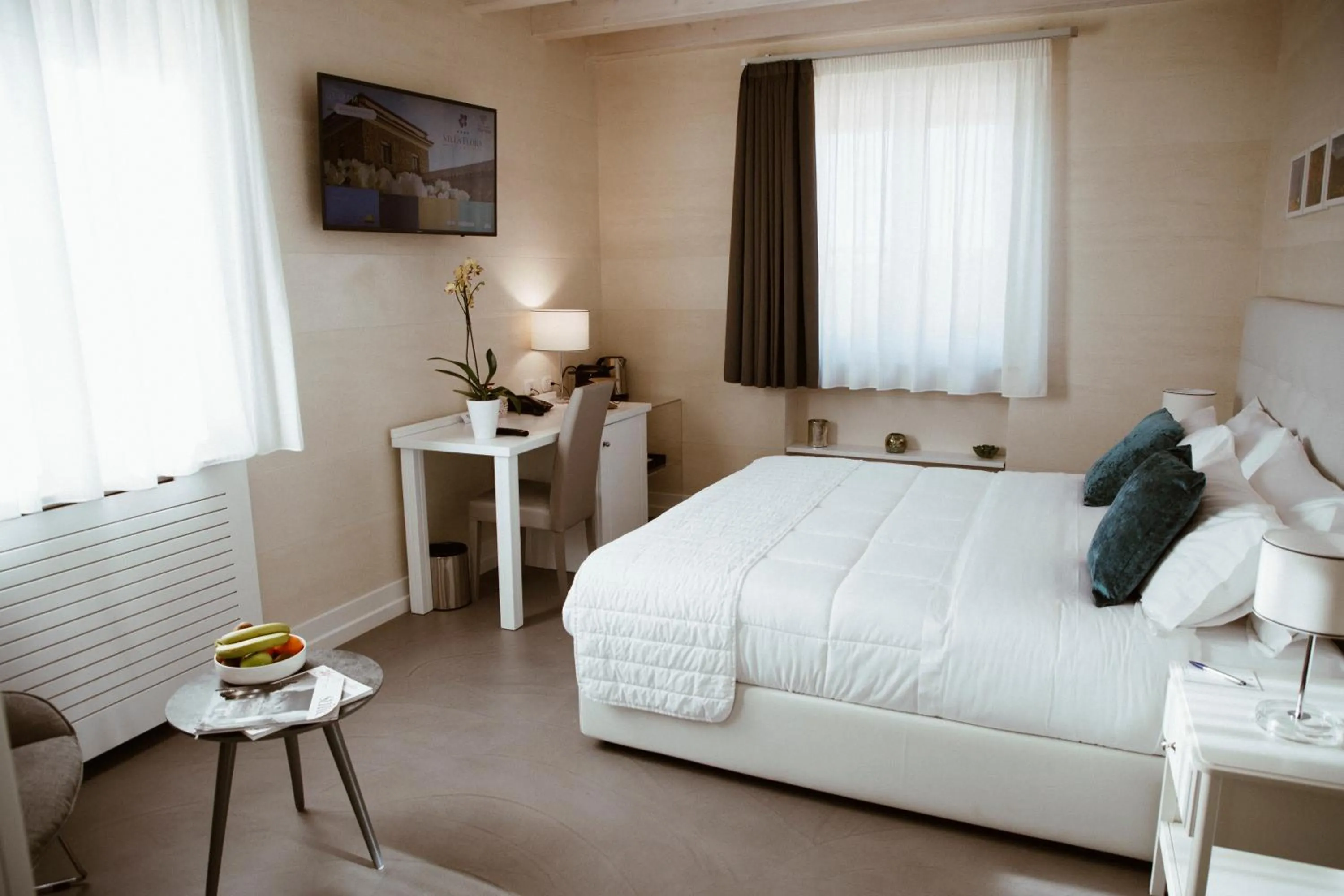 Bed in Hotel Villa Flora Relais