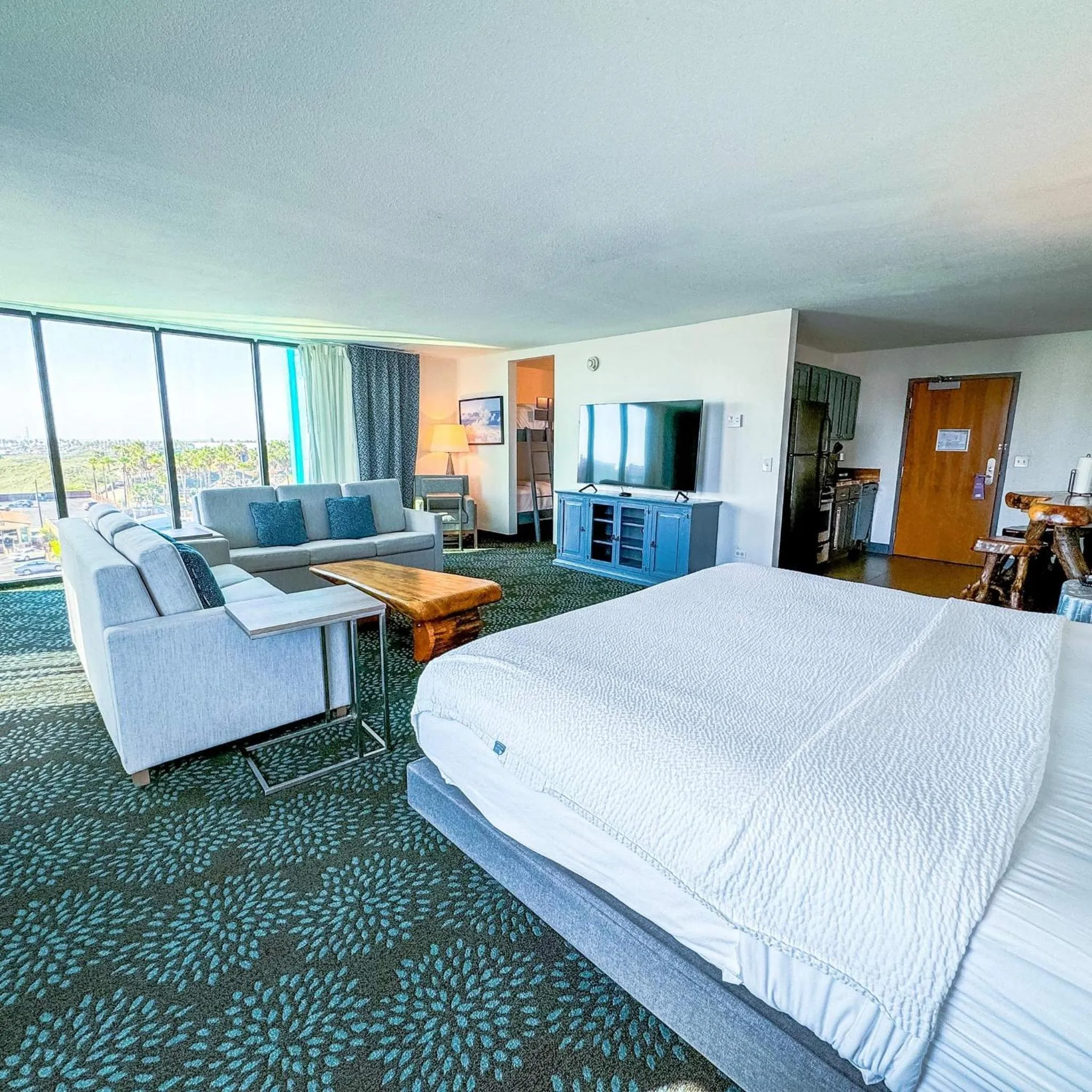 Living room, Bed in Holiday Inn Resort South Padre Island-Beach Front by IHG