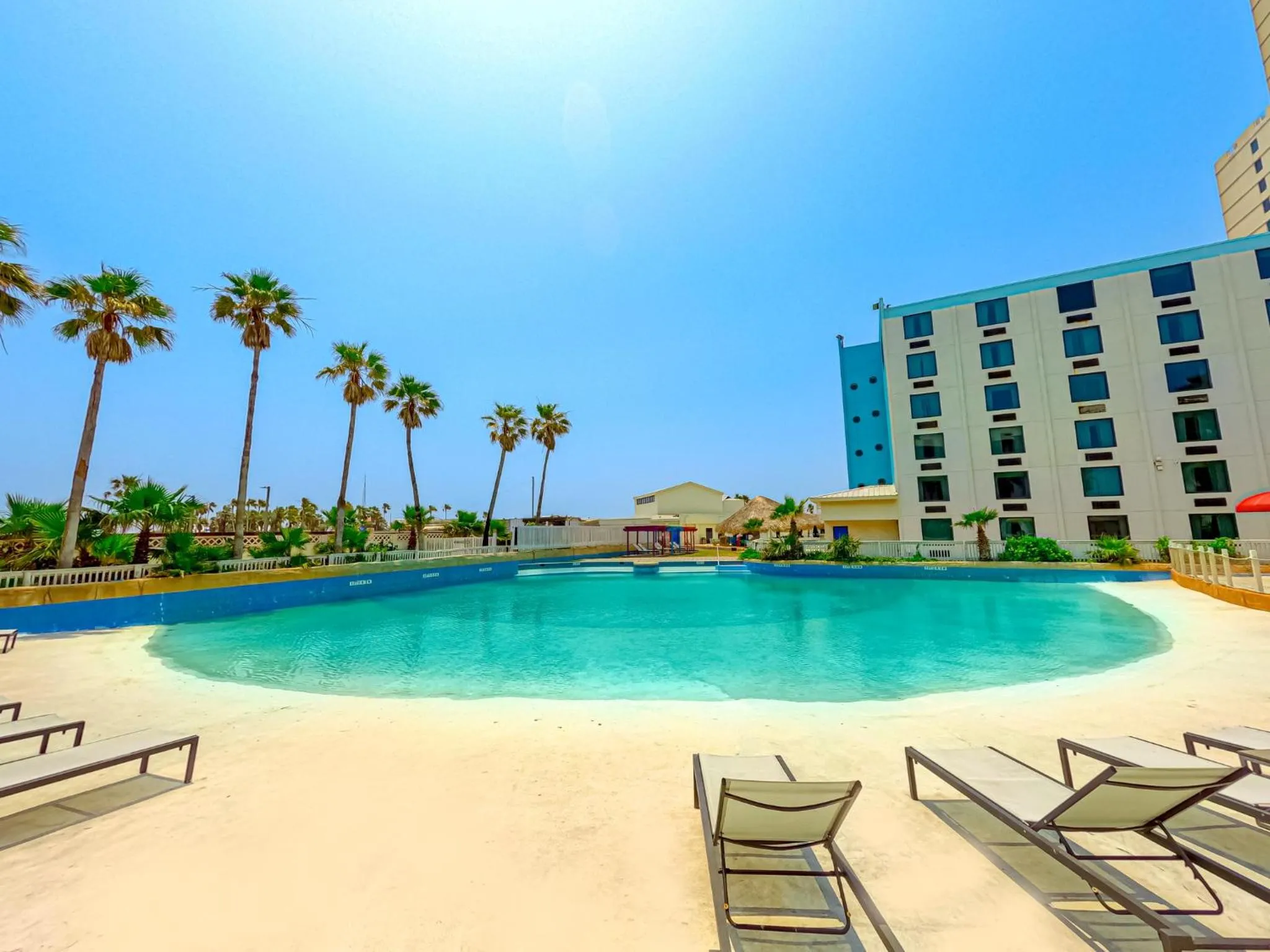 Swimming pool in Holiday Inn Resort South Padre Island-Beach Front by IHG