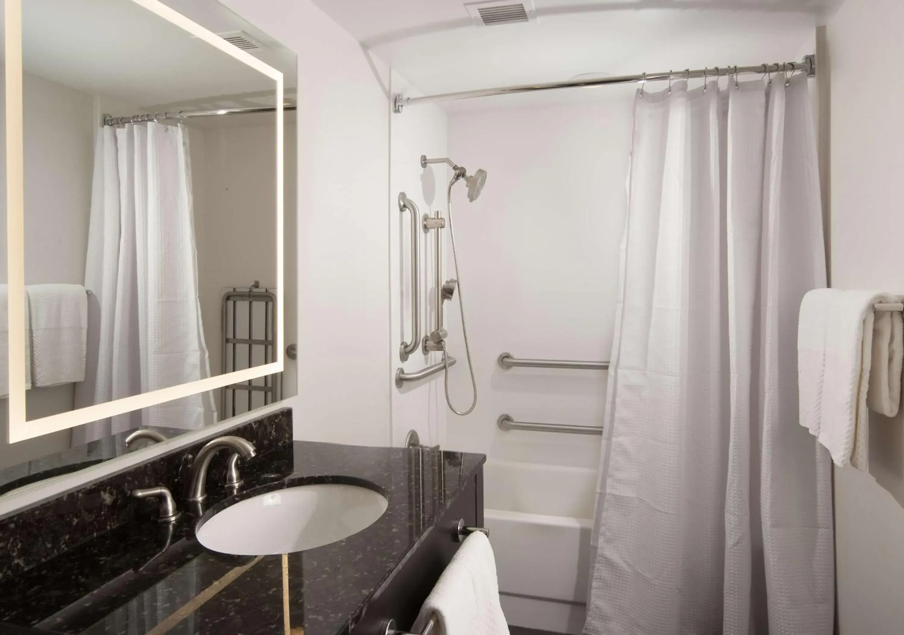 King Room - Mobility Access/Non-Smoking in Embassy Suites by Hilton Raleigh Crabtree King Room - Mobility Access/Non-Smoking in Embassy Suites by Hilton Raleigh Crabtree