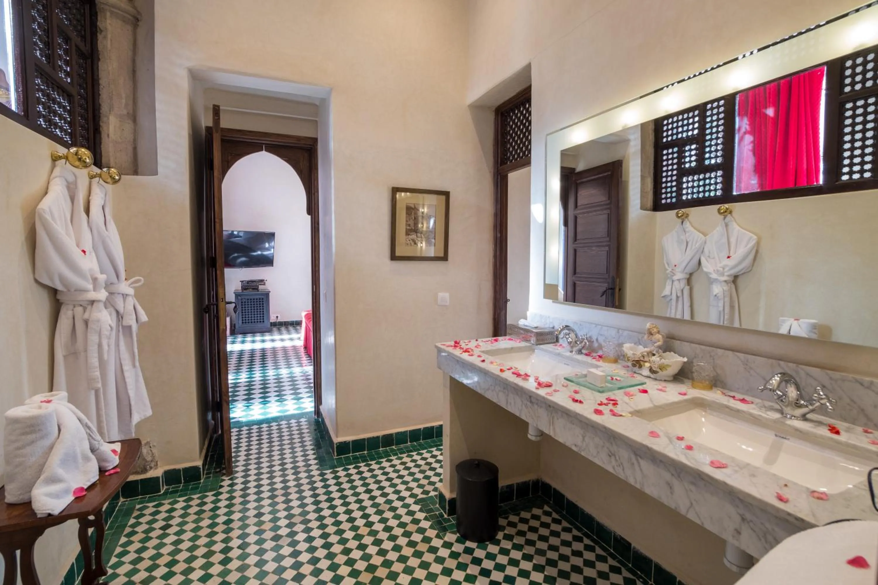 Bed in Le Palais Rhoul and Spa