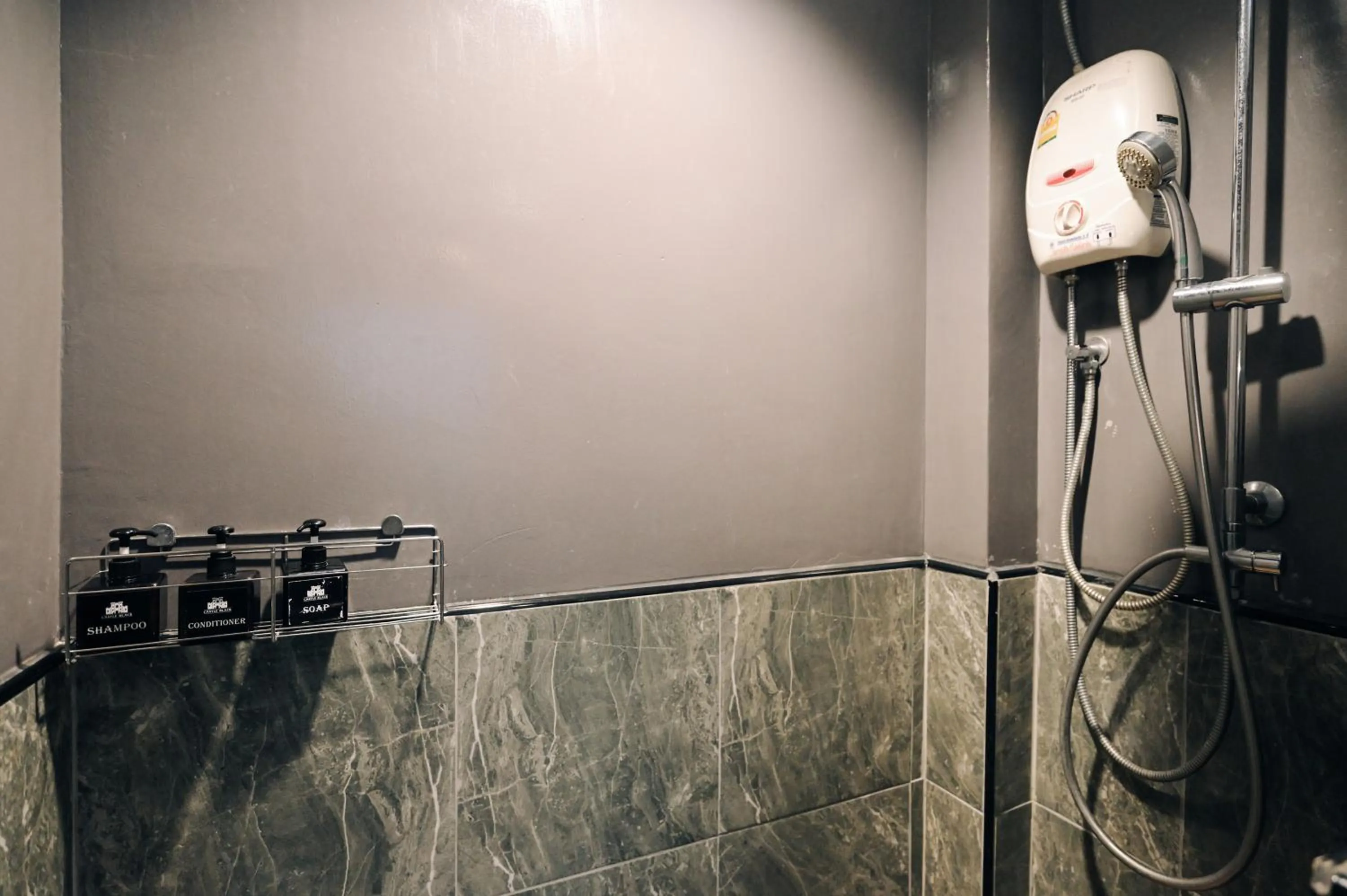 Shower in Castle Black Bangkok