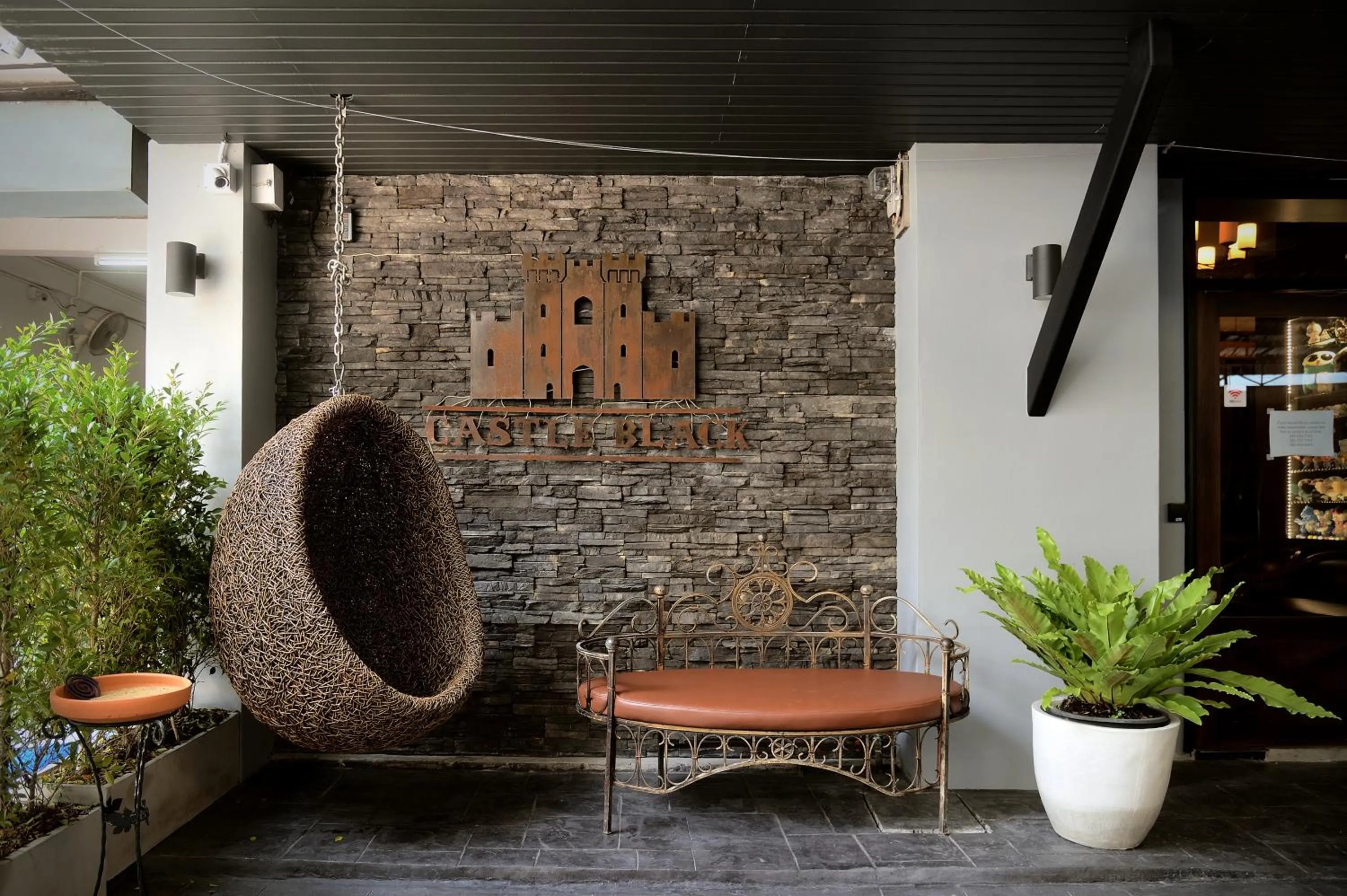 Seating area in Castle Black Bangkok