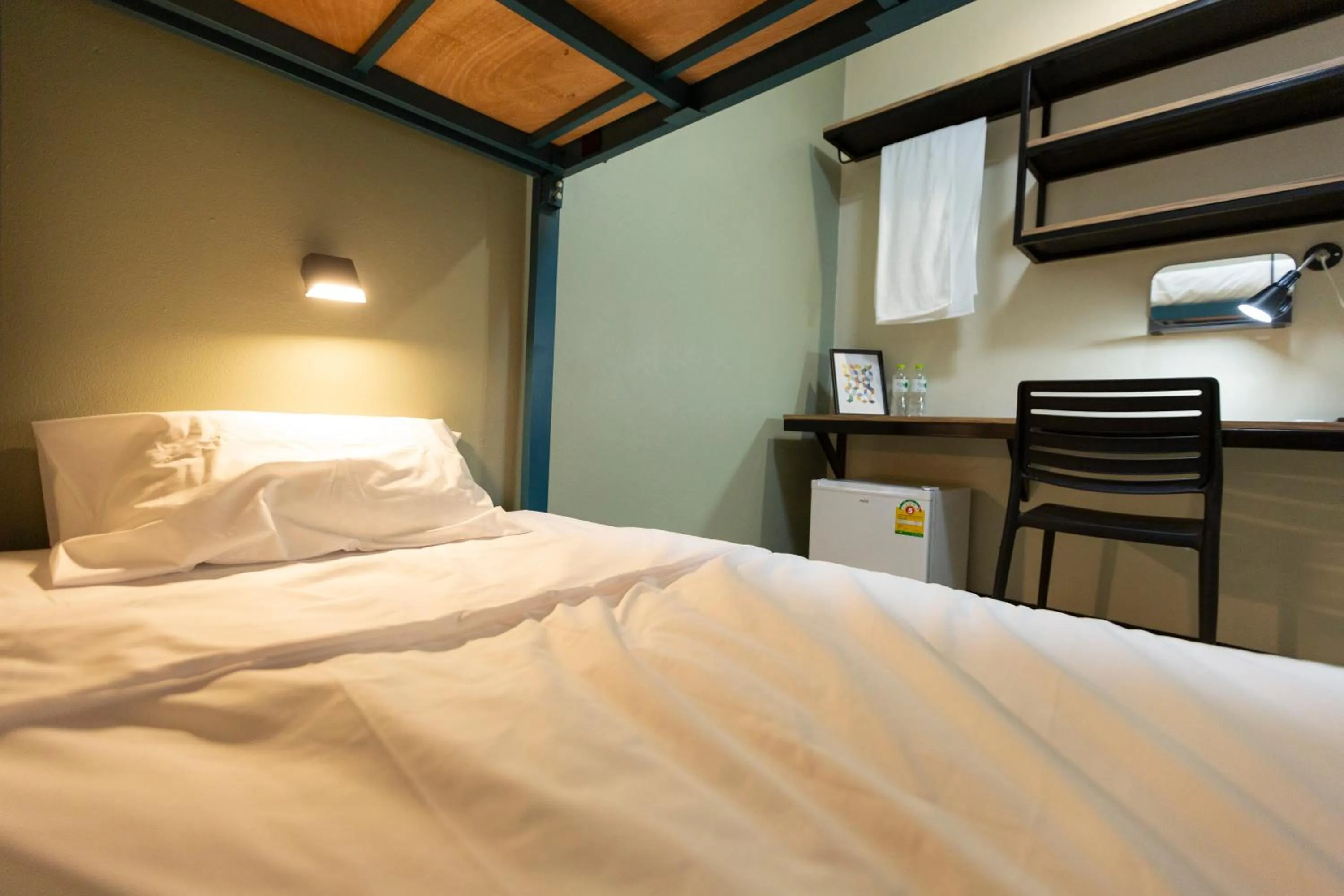 Bed in Kaelyn Cozy Living