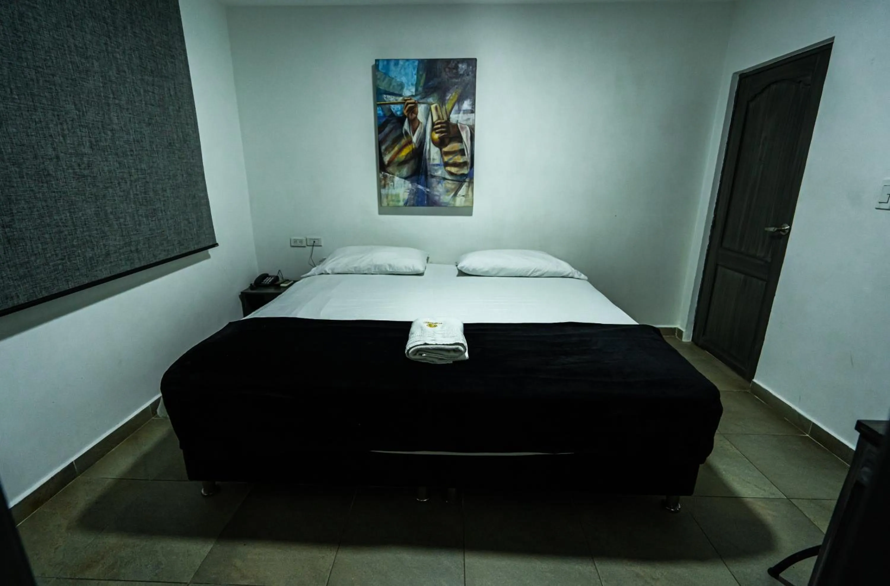 Bed in Hotel Tayromar