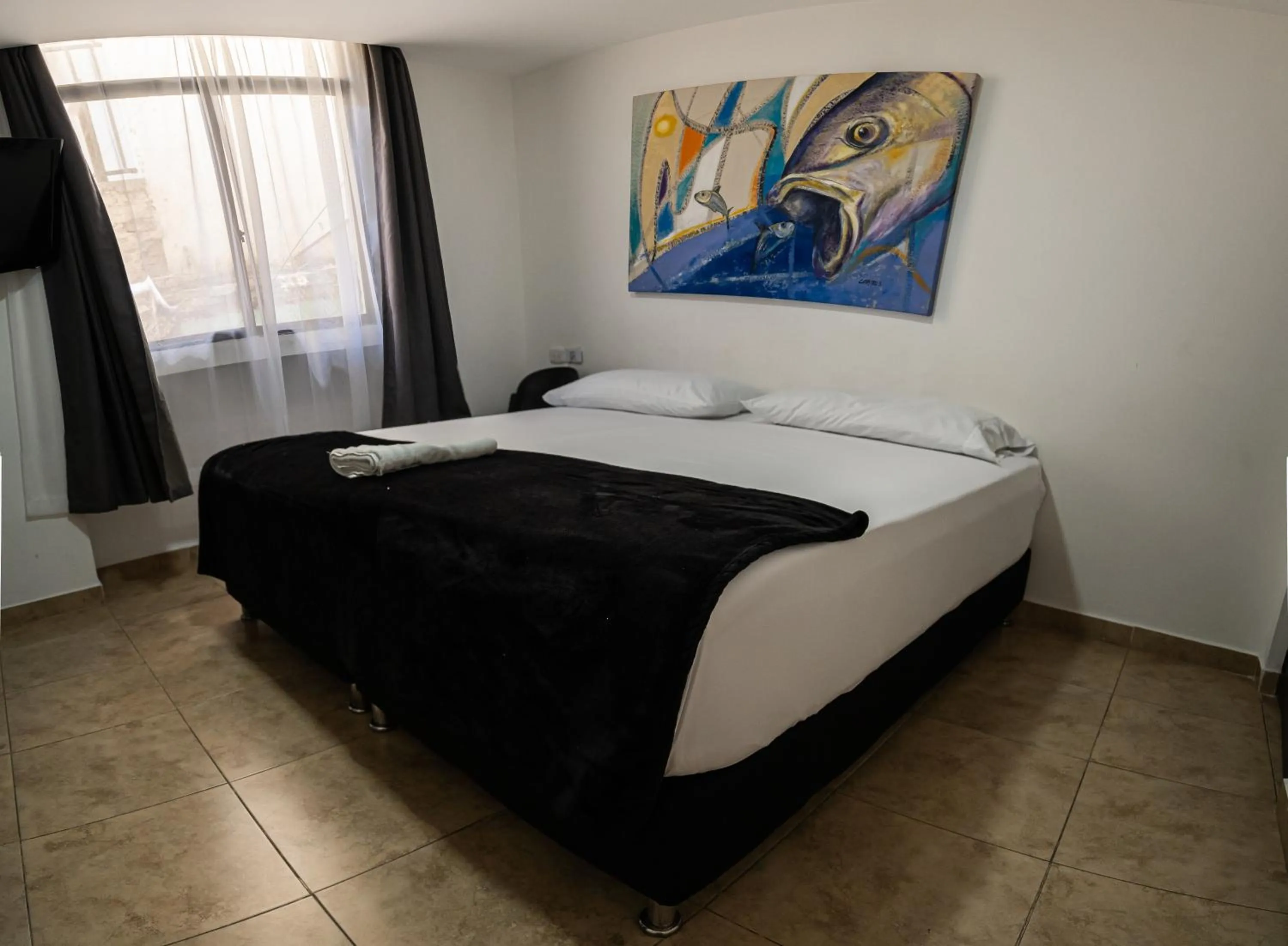 Bed in Hotel Tayromar