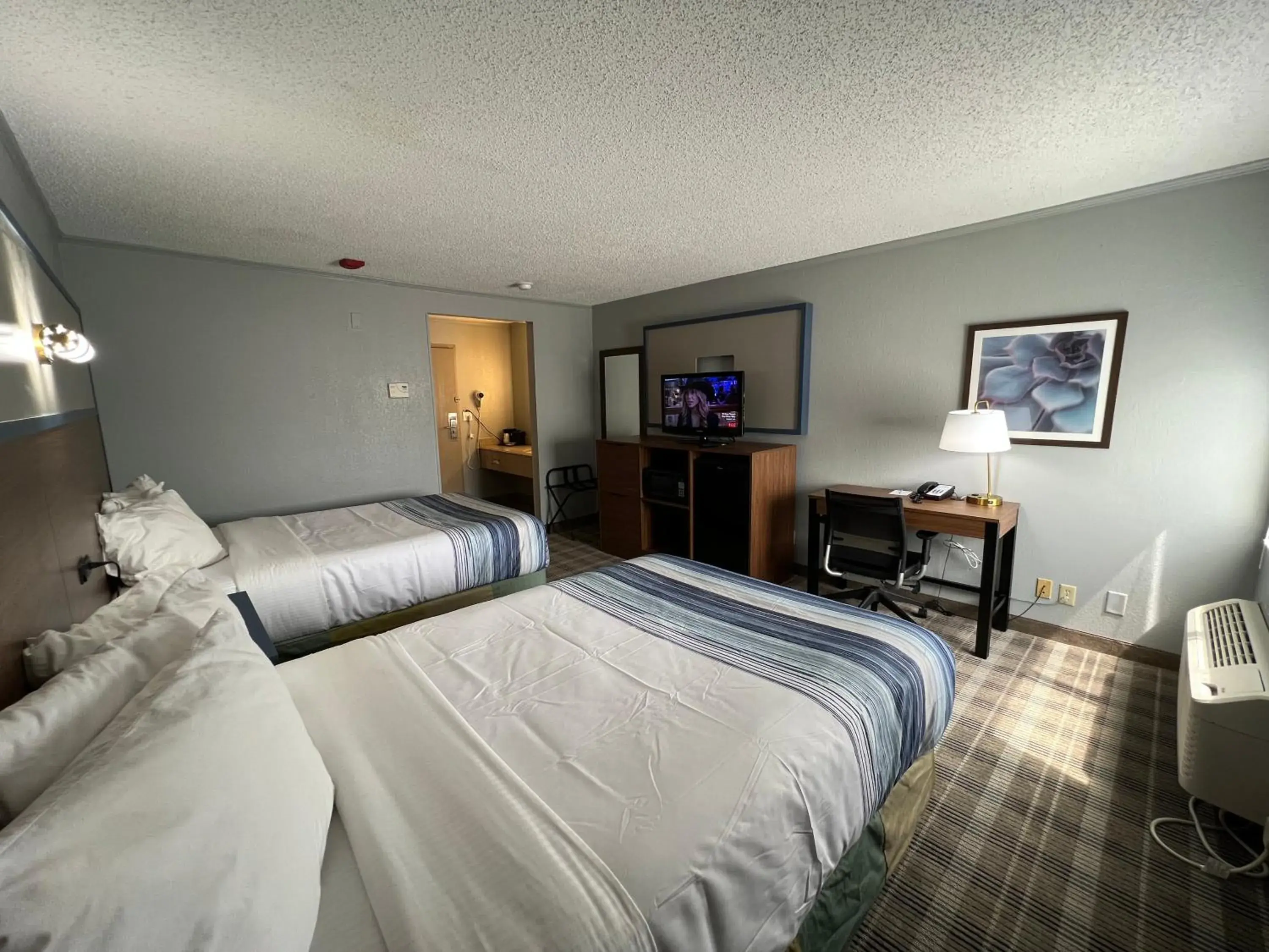 Bed in AmericInn by Wyndham Glendale Milwaukee Bed in AmericInn by Wyndham Glendale Milwaukee