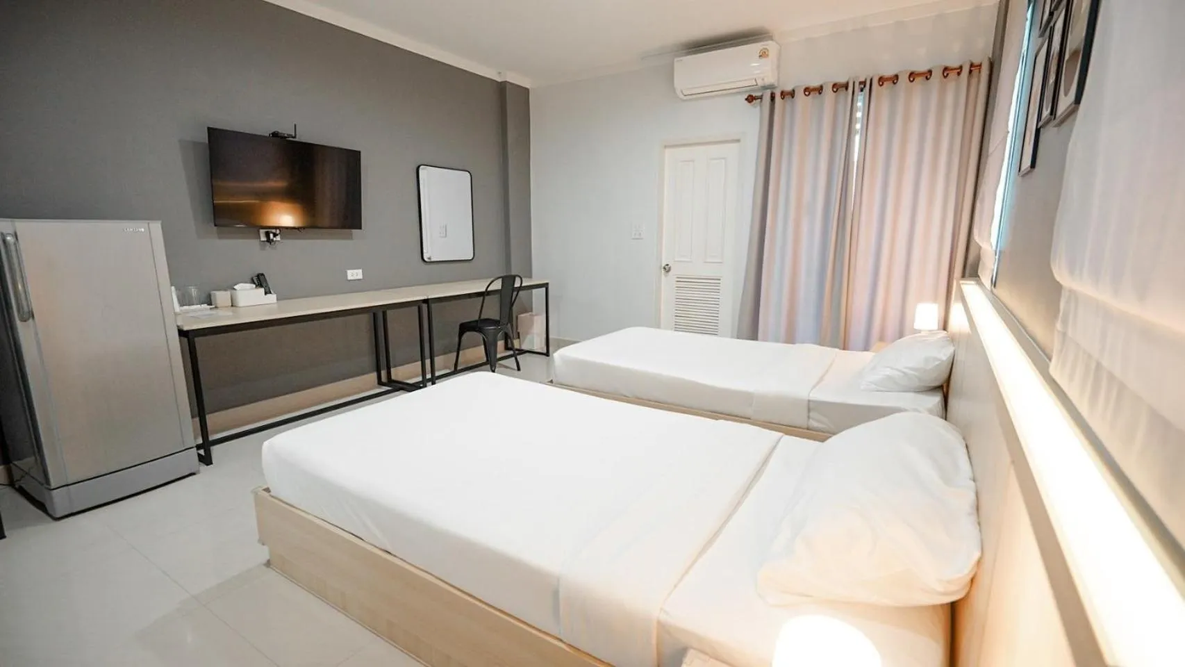 Bed in Boonsiri Boutique Hotel