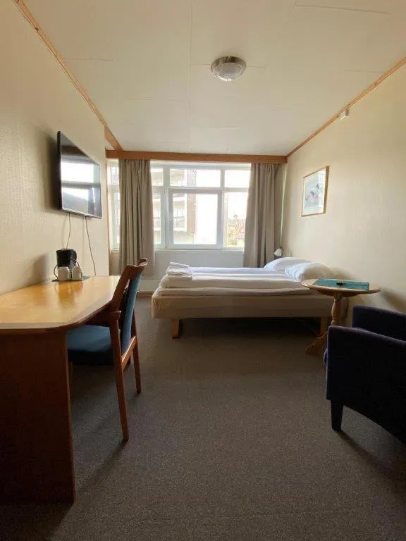 Photo of the whole room, Bed in Hotel Svartisen