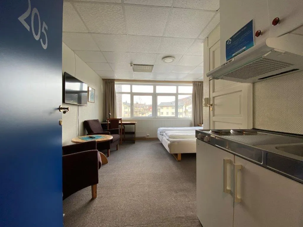 Photo of the whole room, Bed in Hotel Svartisen