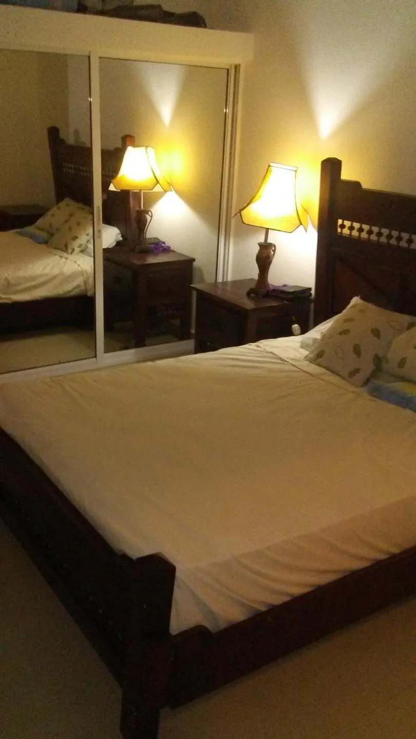 Bed in Rolando share apart