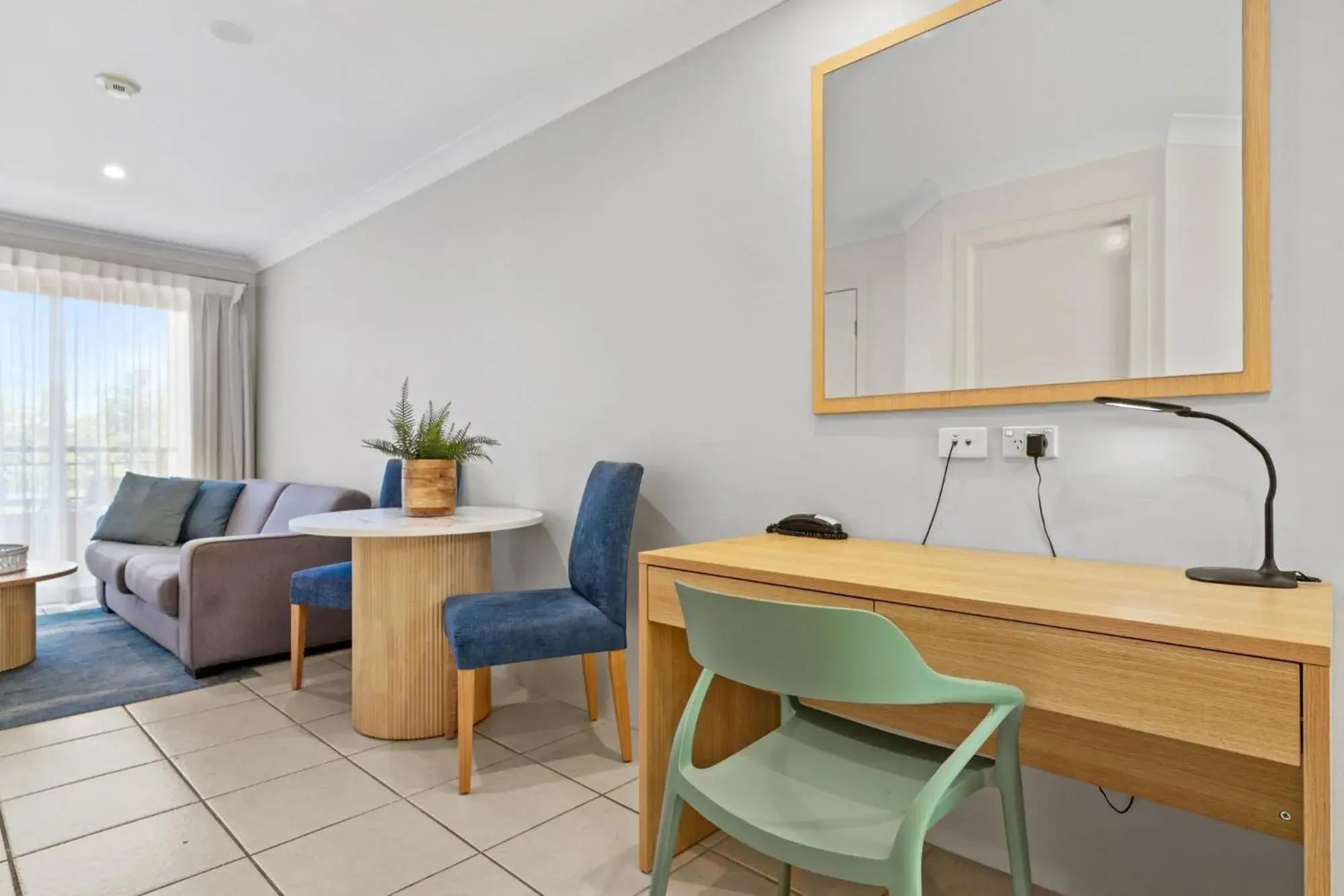 Living room in Terrigal Sails Serviced Apartments Living room in Terrigal Sails Serviced Apartments