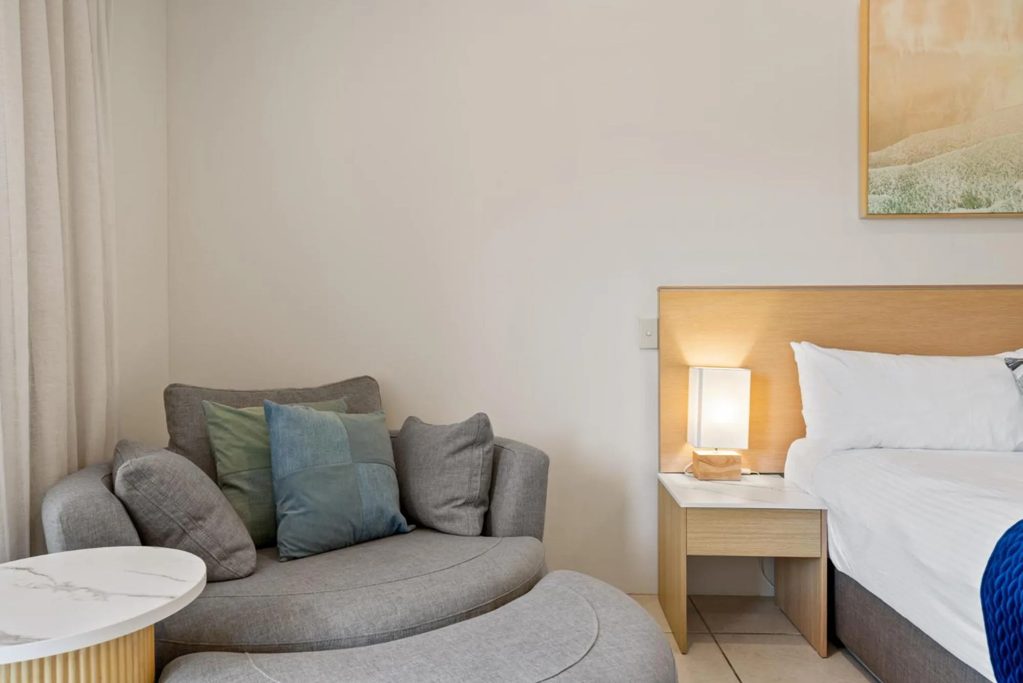 Seating area, Bed in Terrigal Sails Serviced Apartments